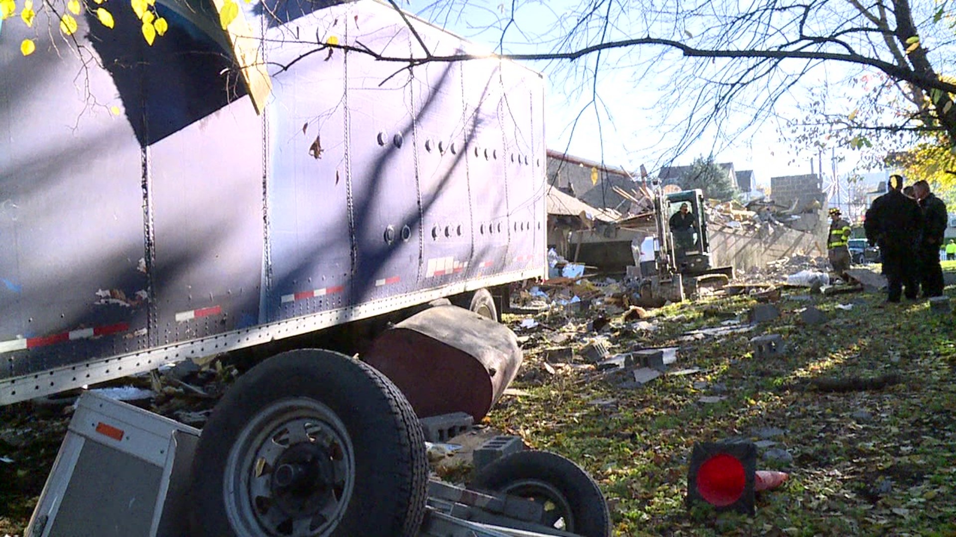 A wild crash near a road notorious for tractor-trailer wrecks left a lot of damage behind to one woman's home.