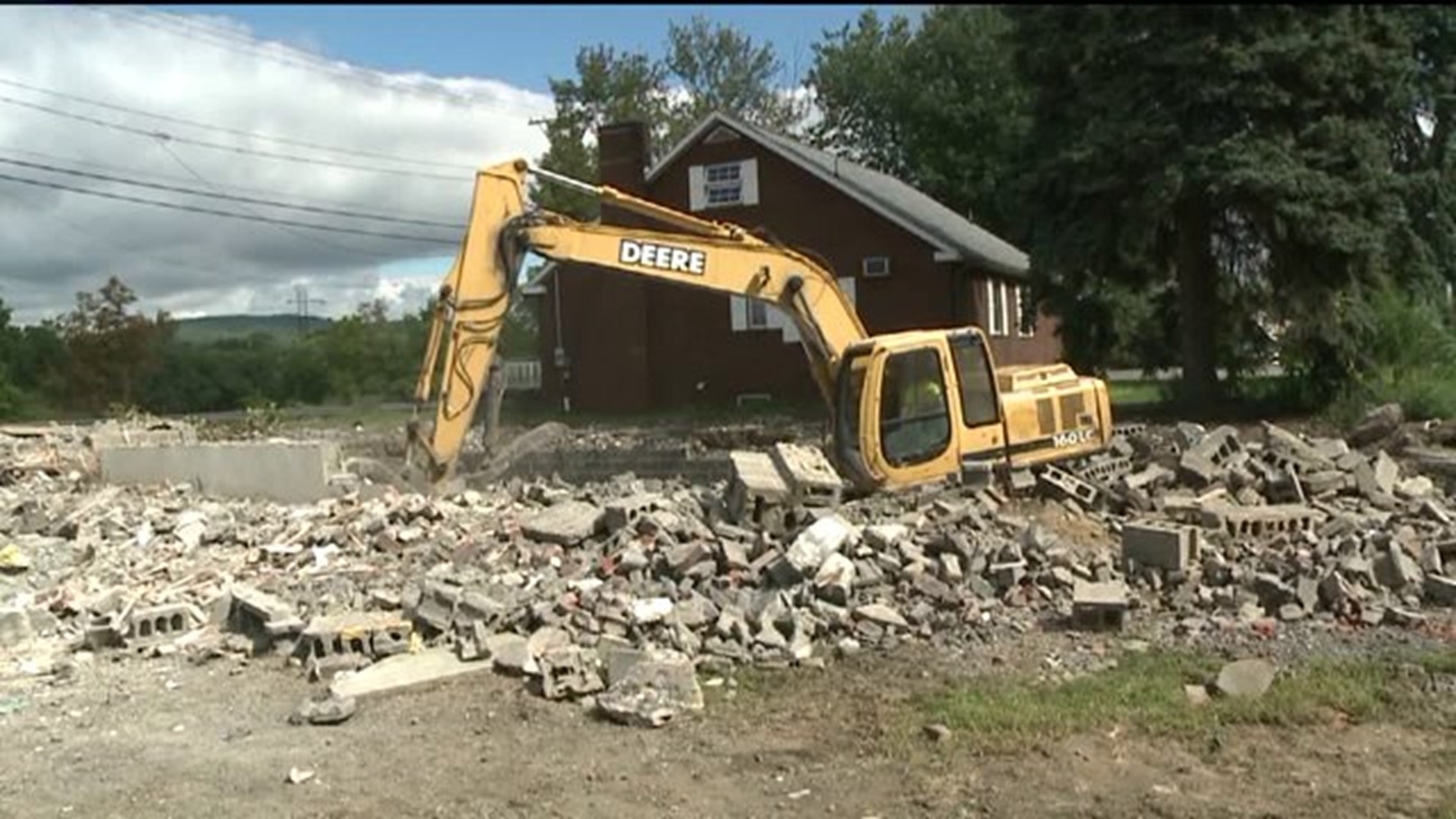 Three Years After Flood, Homes Finally Torn Down