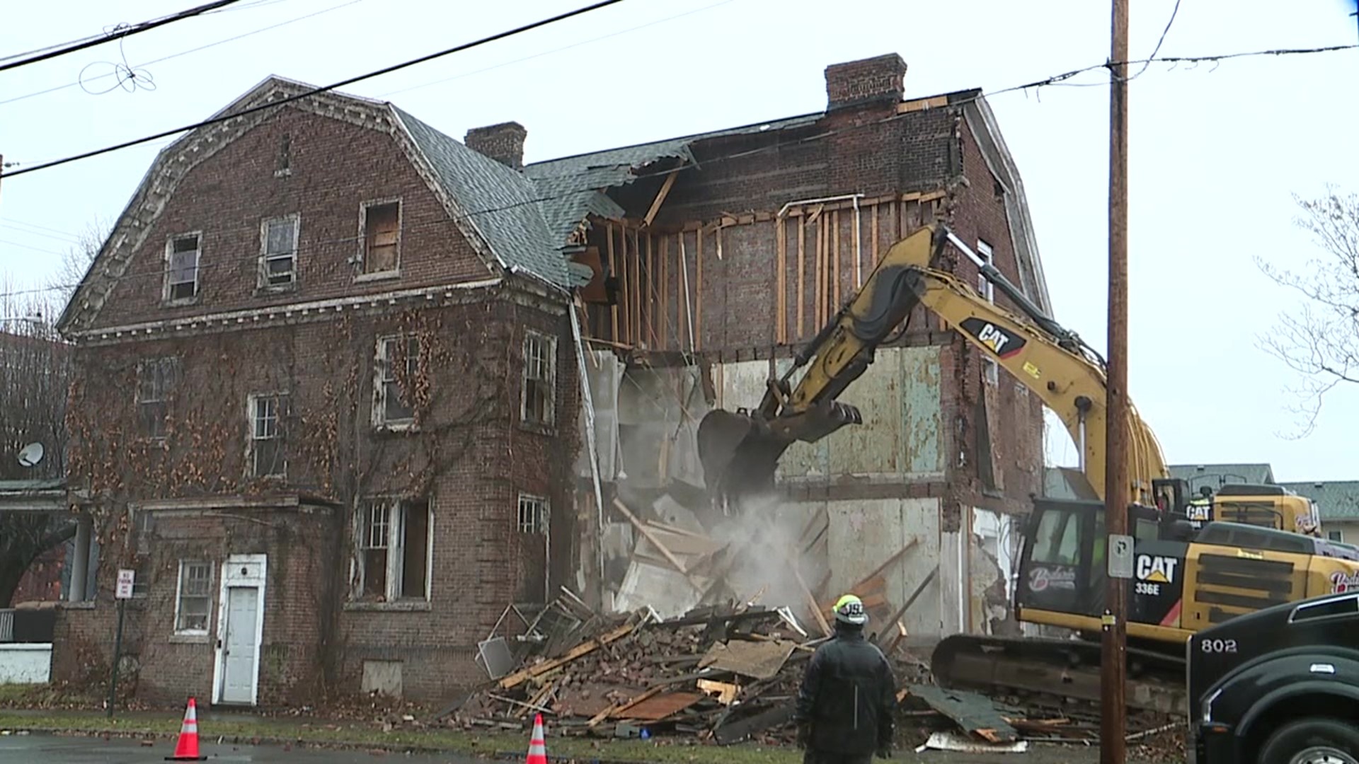 The city began work Thursday morning to remove the old structures on South Franklin Street.