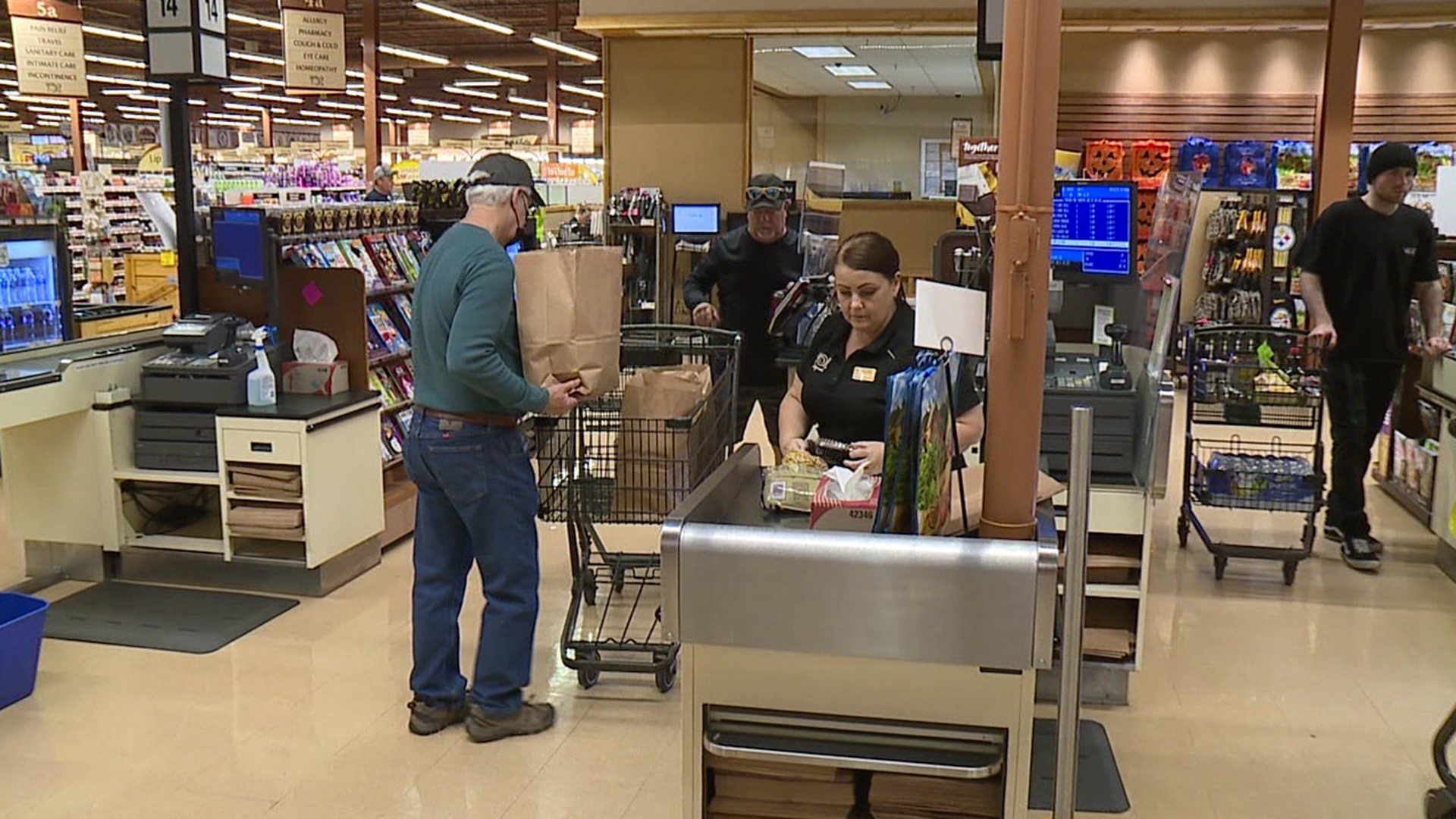 Shoppers could purchase reusable bags for 99 cents or paper bags for a nickel a piece.