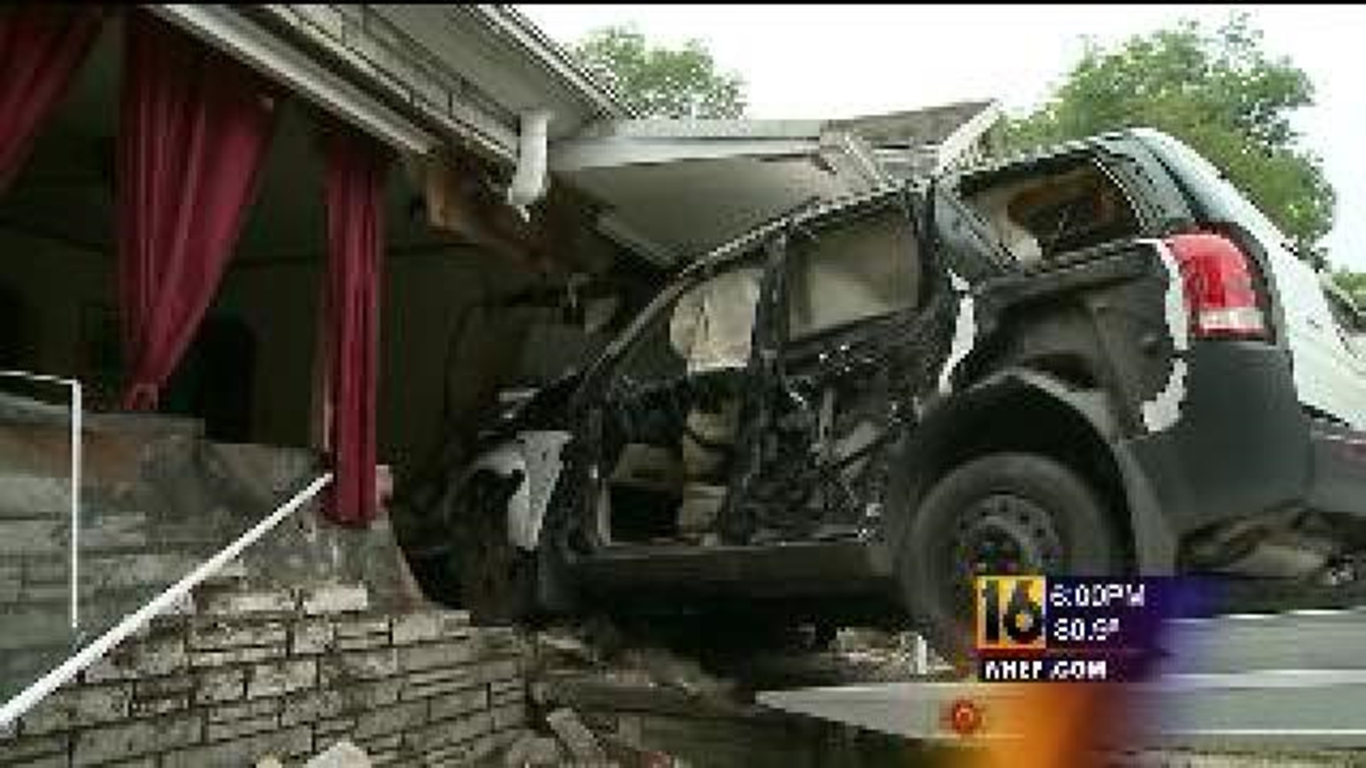 Two Hurt When SUV Slams Home