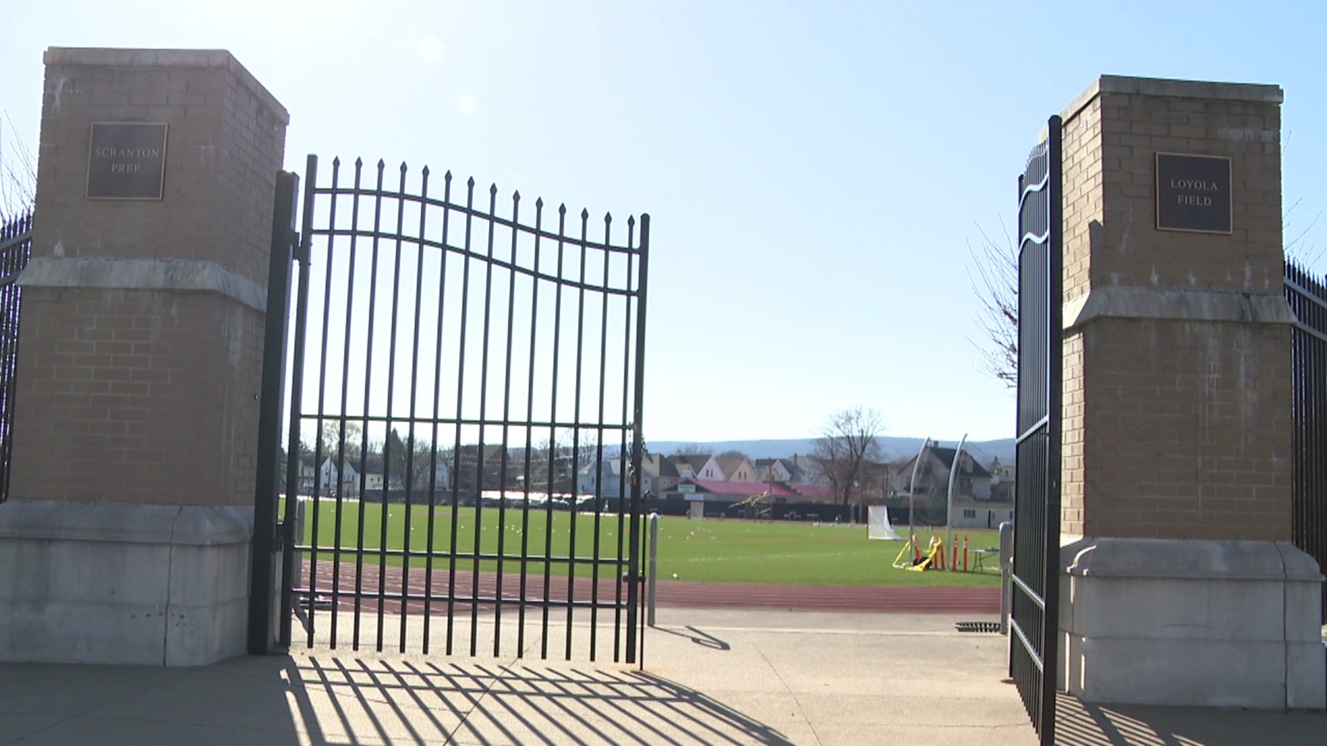 Three teenagers were arrested for allegedly flashing a gun at kids behind Scranton Prep's Loyola Field.