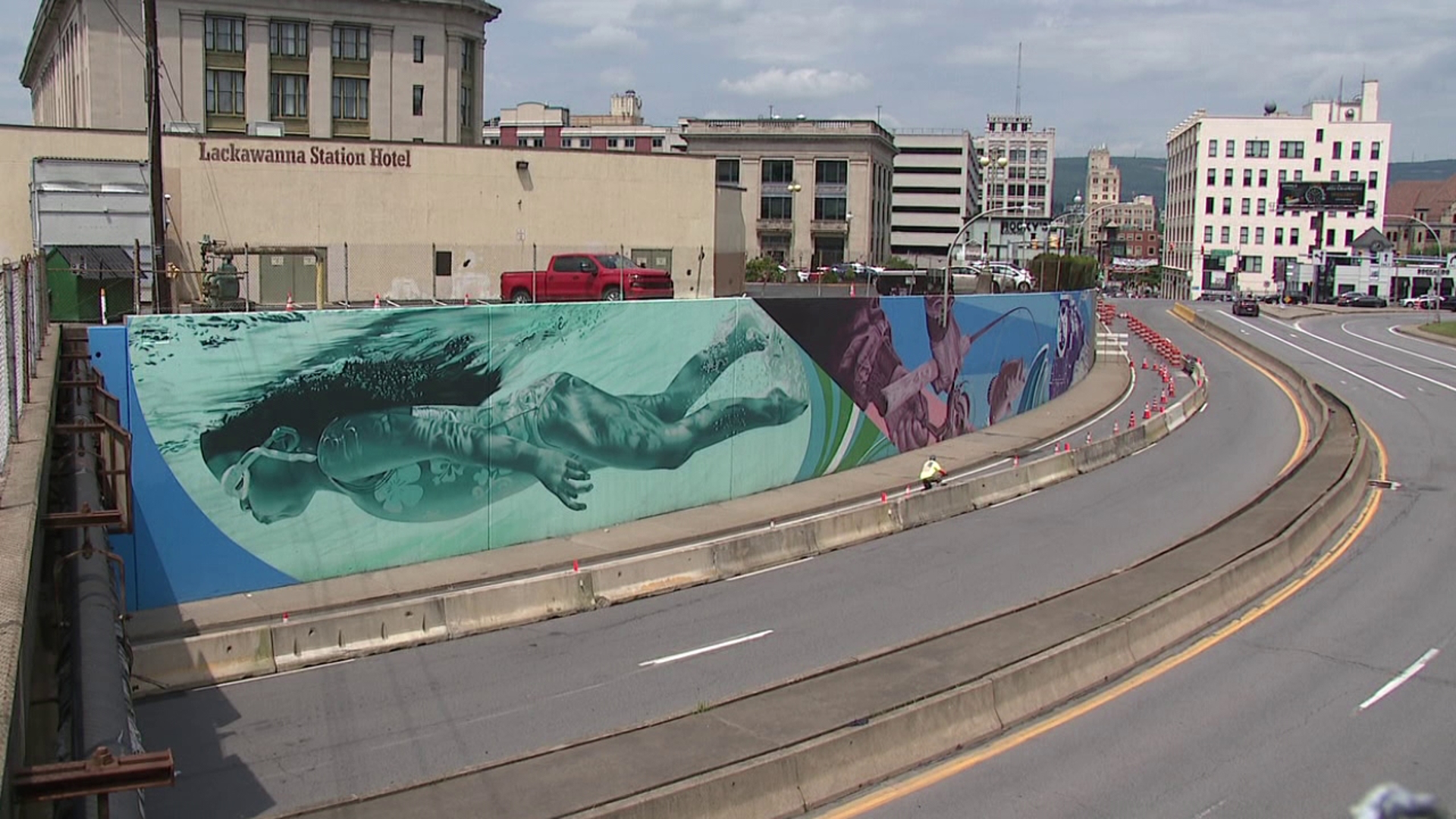 One lane of the Biden Expressway in Scranton is shut down as crews work on a mural project.