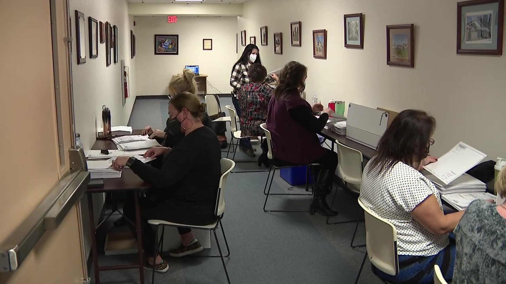 County election officials worked over two days to count more than 32,000 mail-in and absentee ballots.