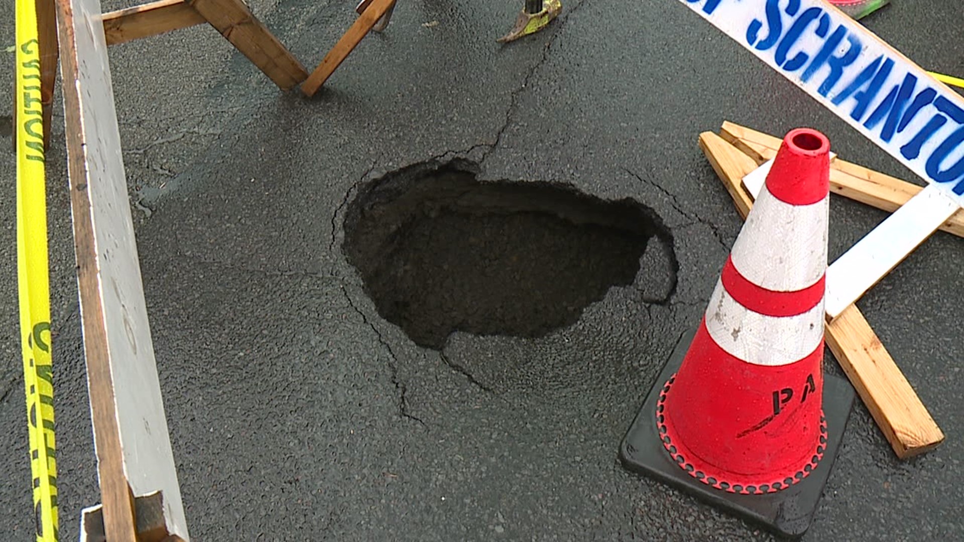 A large hole opened at the intersection of Poplar Street and Quincy Avenue in Dunmore.