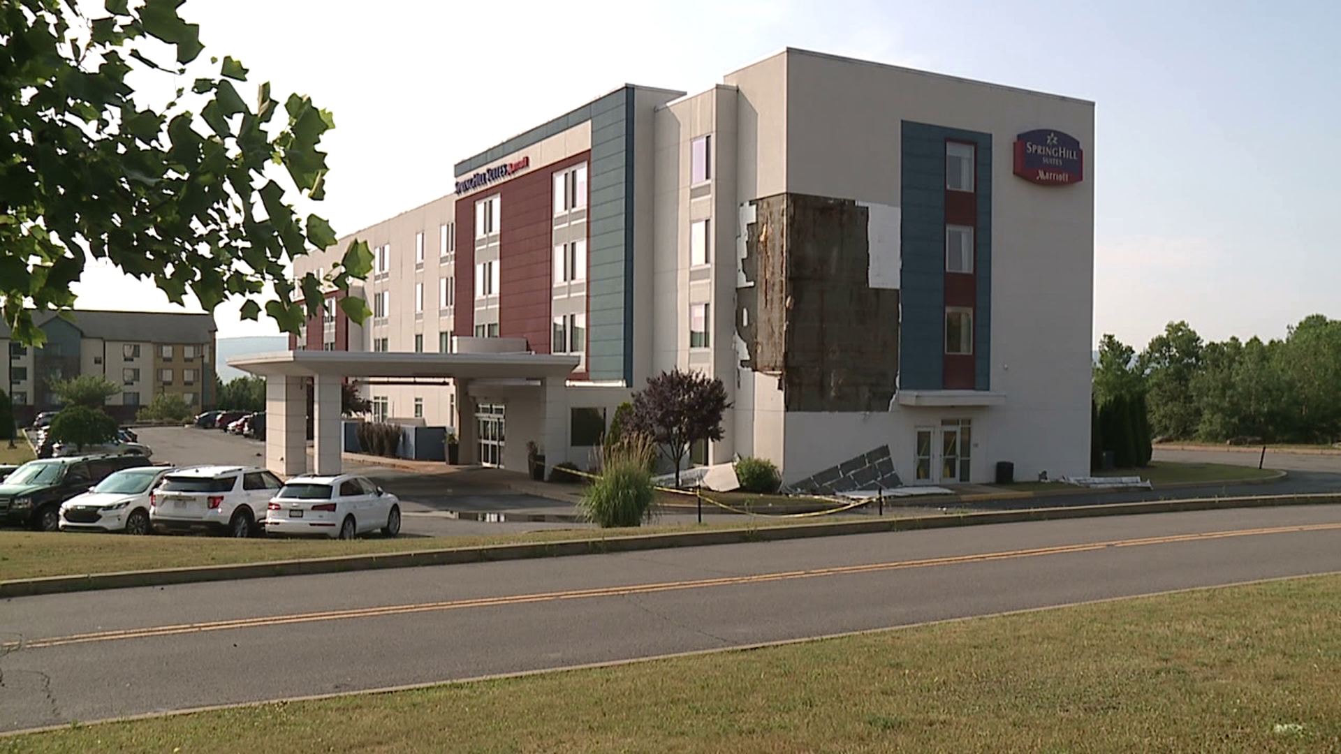 Fire crews responded to SpringHill Suites in Moosic Saturday afternoon after part of an exterior wall collapsed.