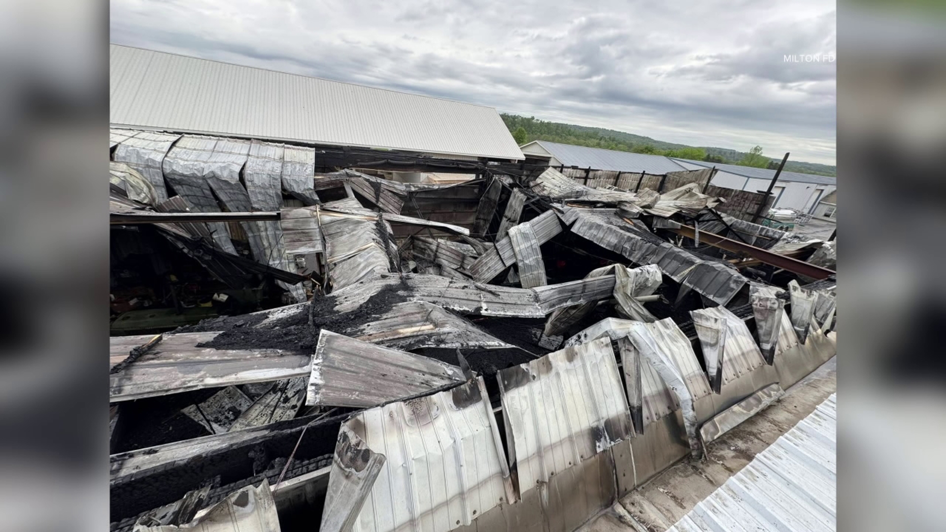 Firefighters battled a commercial building fire in Middle Creek Township for four hours on Saturday morning. 
