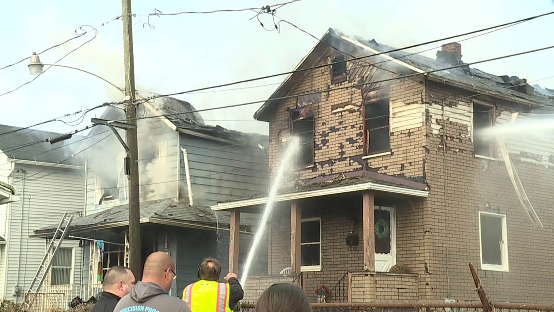 A fire in Plymouth engulfed two homes shortly before 8 am. on Monday.