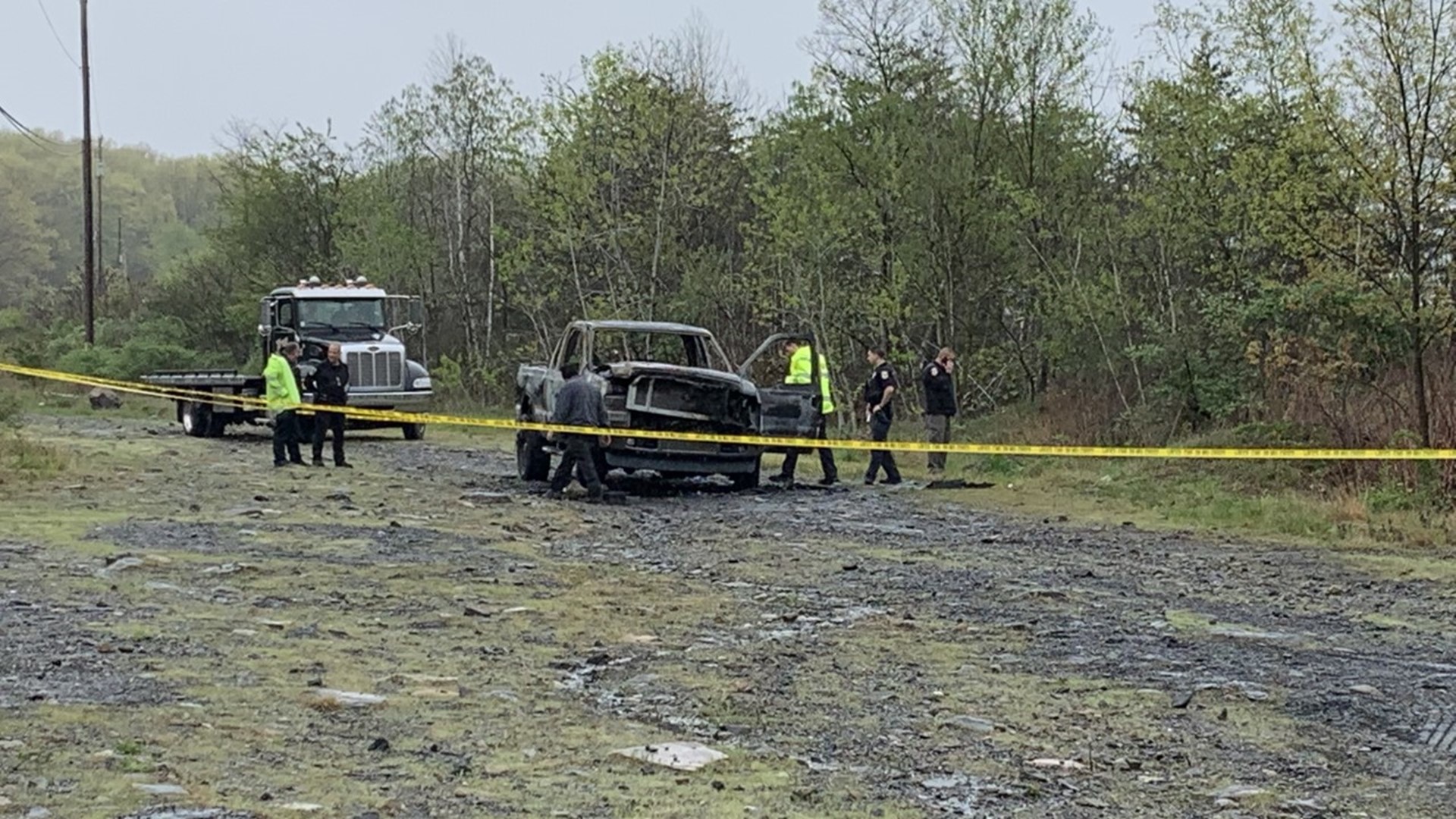 Police are investigating after a body was found near a car fire along Burma Road in St. Clair Saturday morning.