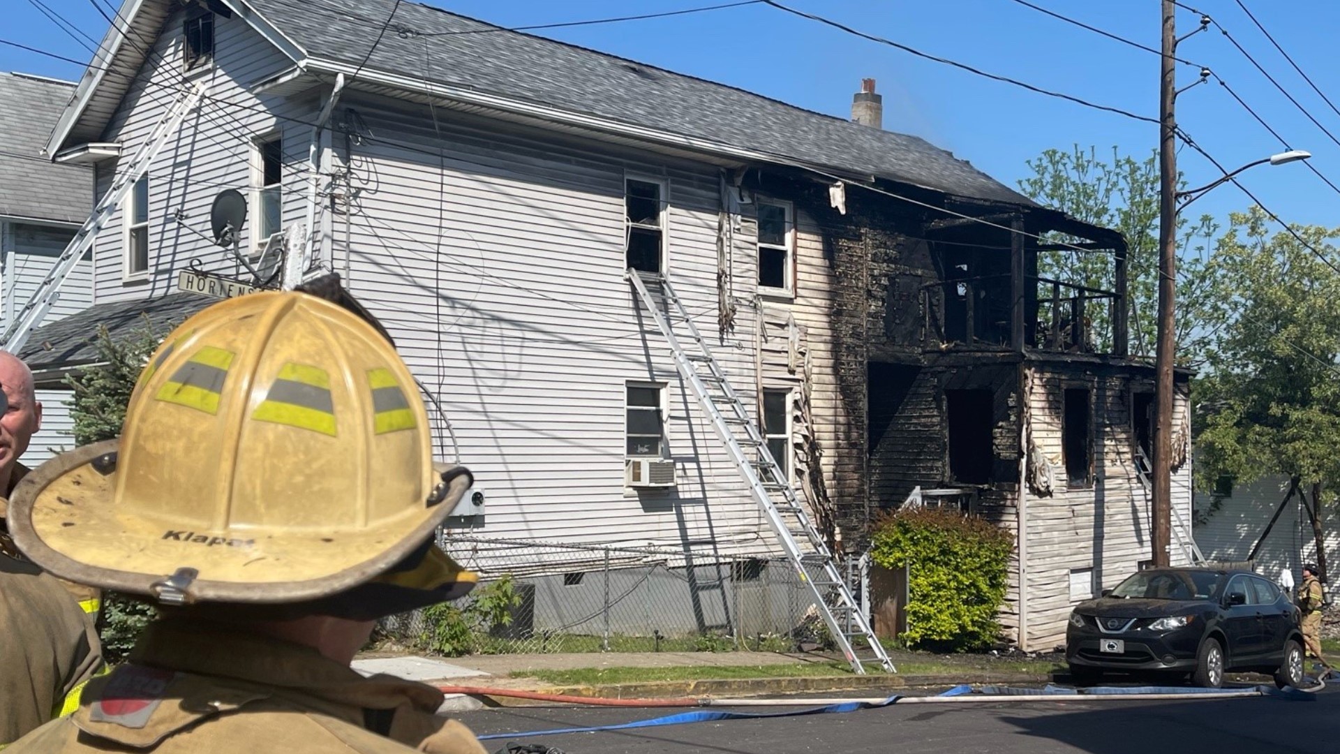 The residents of two apartments on Scott Street got out safely after the fire started Wednesday morning.