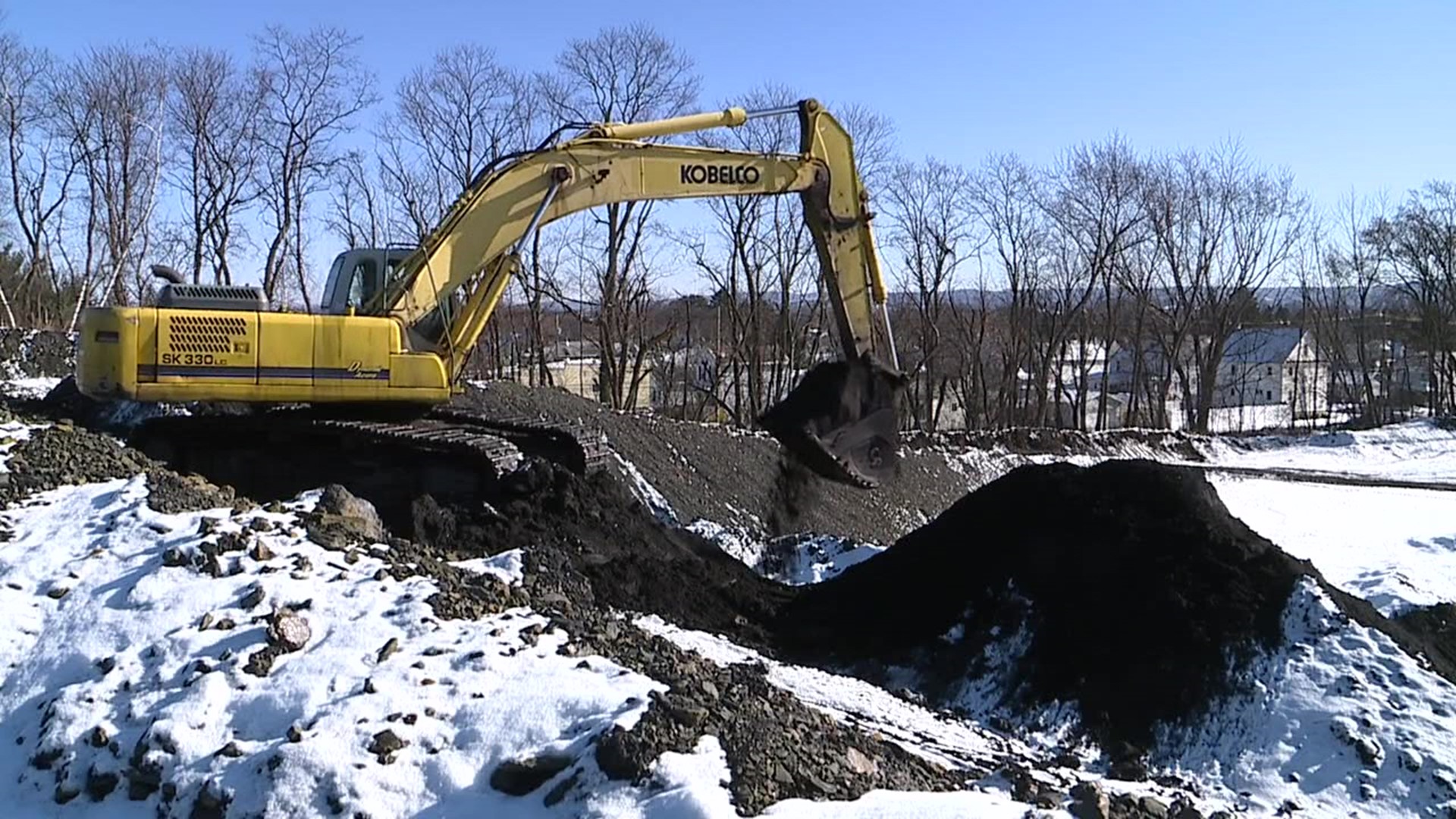 State and federal officials made an announcement Monday about federal funding meant to help eliminate some of the scars that came from energy generation in the past.