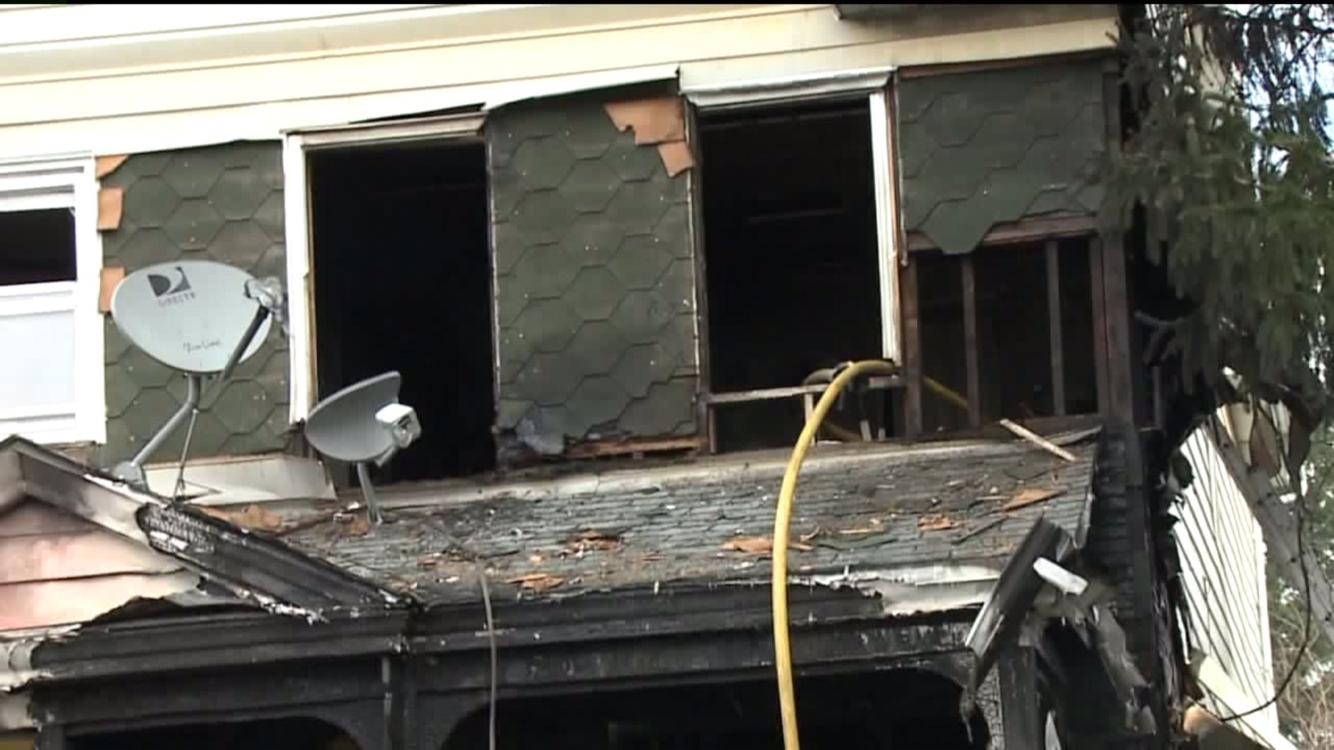 Women Leaps from Window to Escape Flames