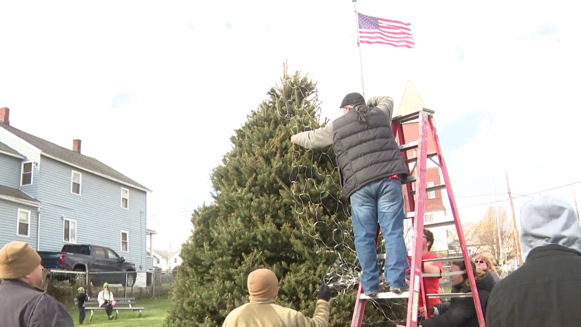 Recruiters and future military candidates gathered Saturday to decorate the Warrior Tree before the lighting ceremony Sunday.