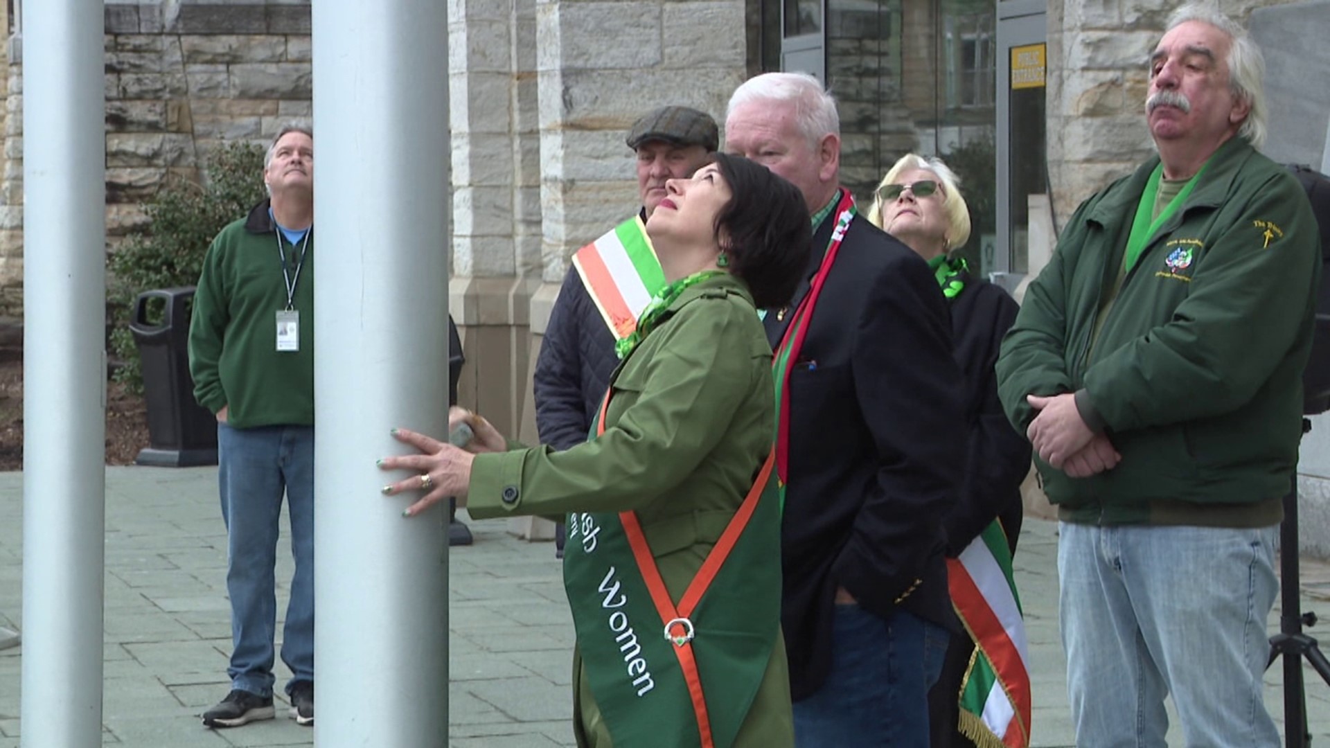 As the city prepares for St. Patrick's Day, groups gathered to raise the Irish flag Sunday.