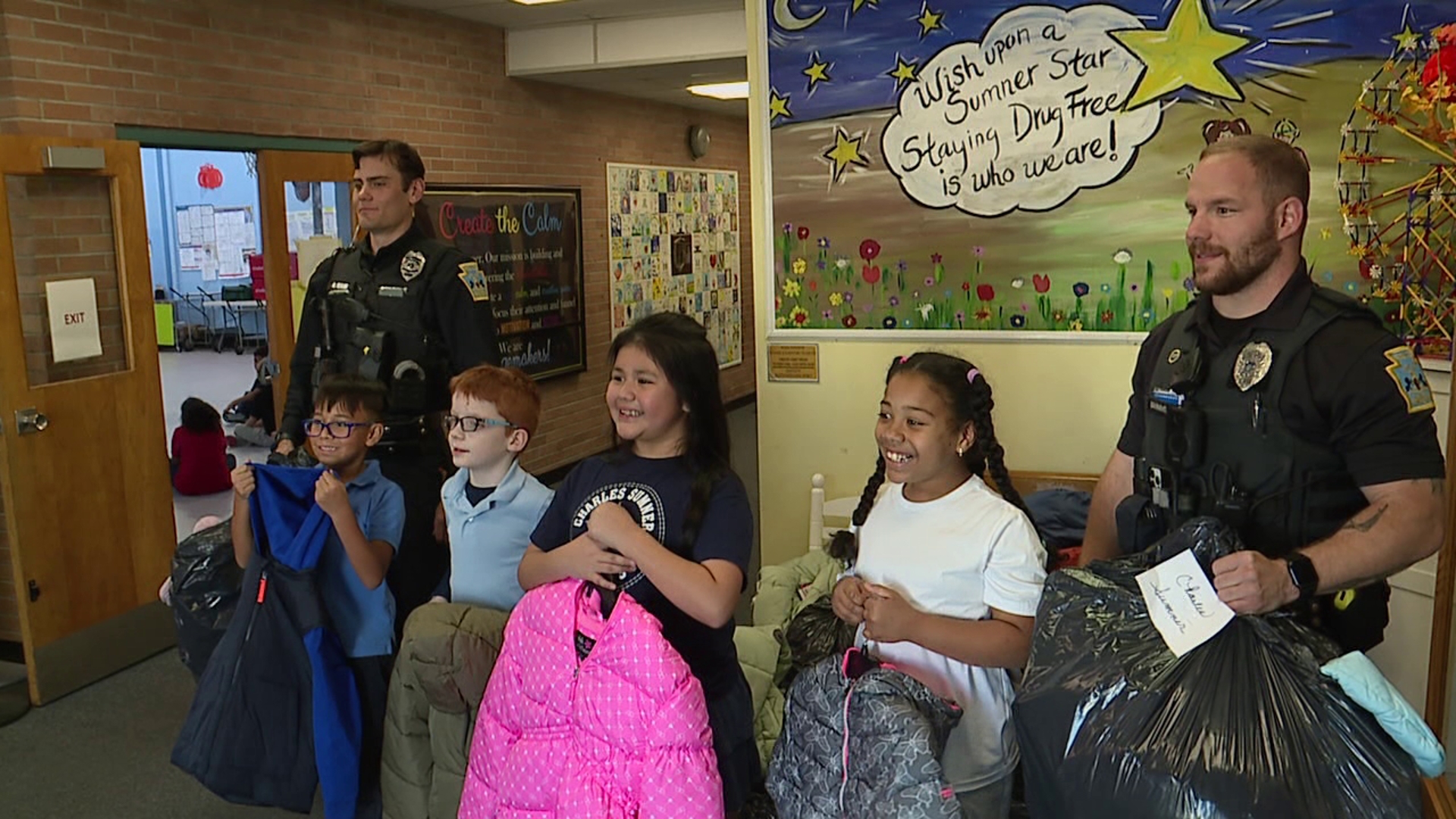 Despite the warm fall weather, officers in Scranton are looking to protect and serve the city's youth from the winter months ahead by handing out brand new coats.