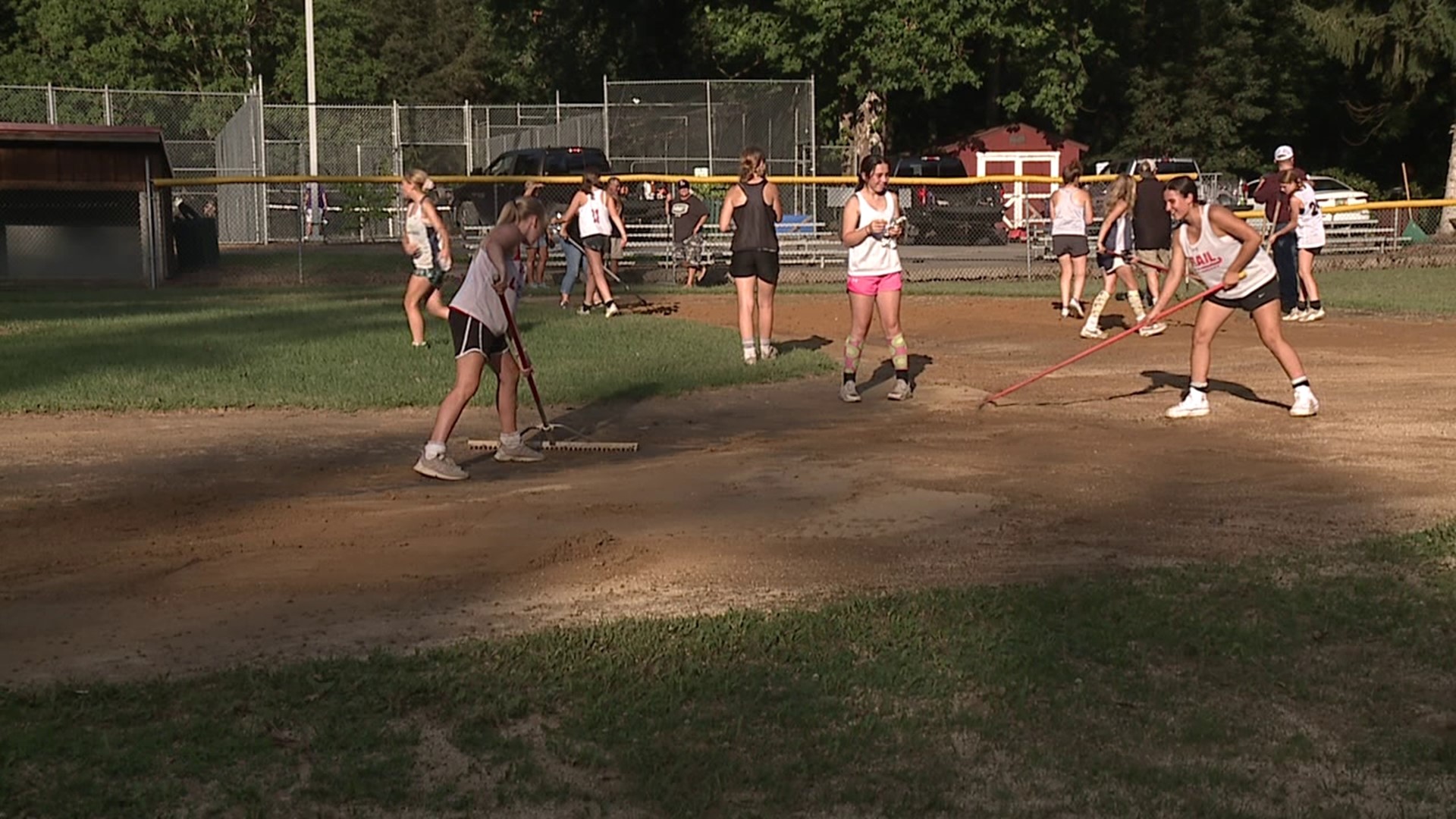 Players, coaches, and parents worked to bring the Christy Matthewson Little League Field back to life after it was lost under feet of water from Saturday's storms.