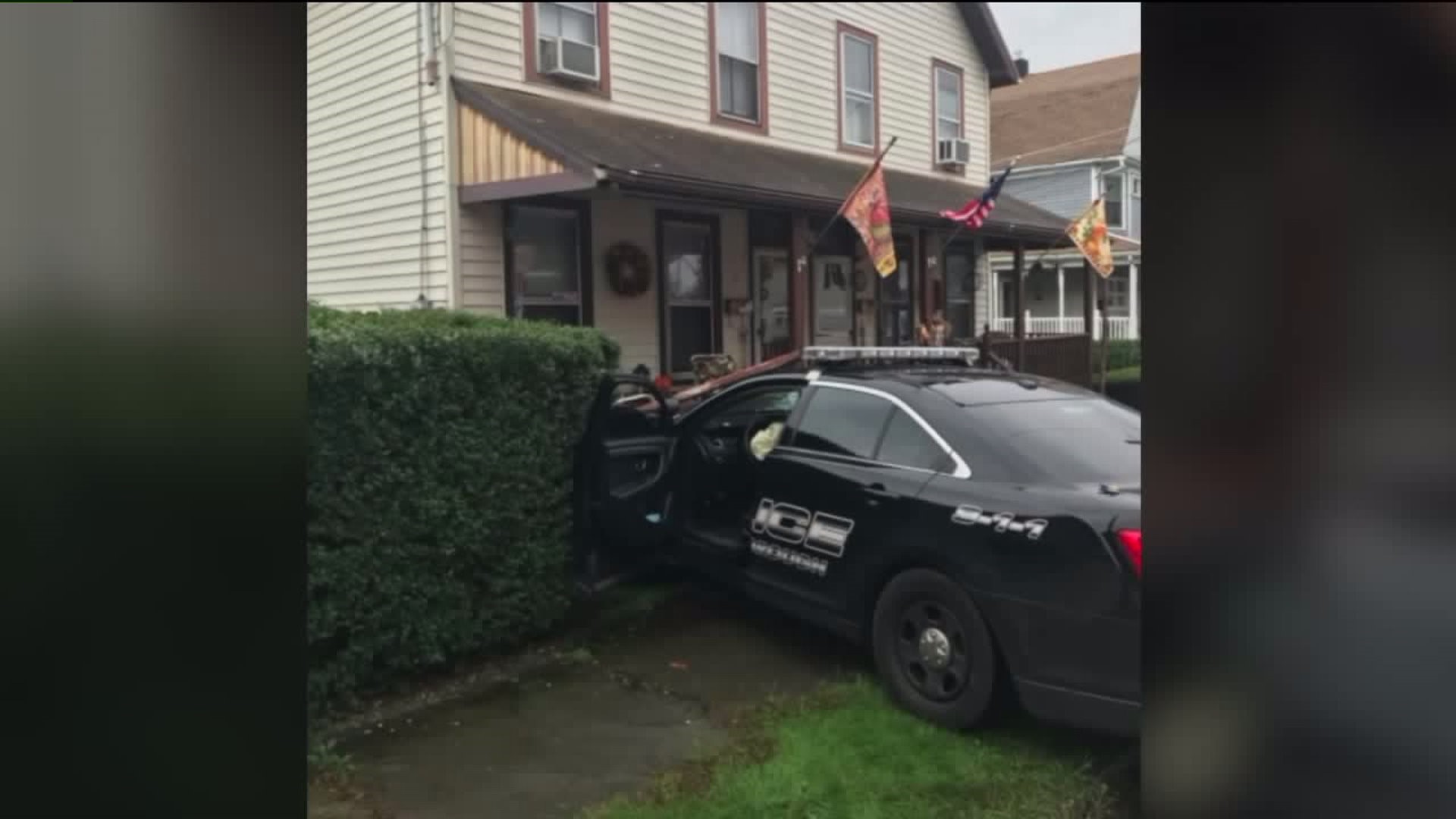 Police Cruiser Slams into Porch While Chasing Speeder