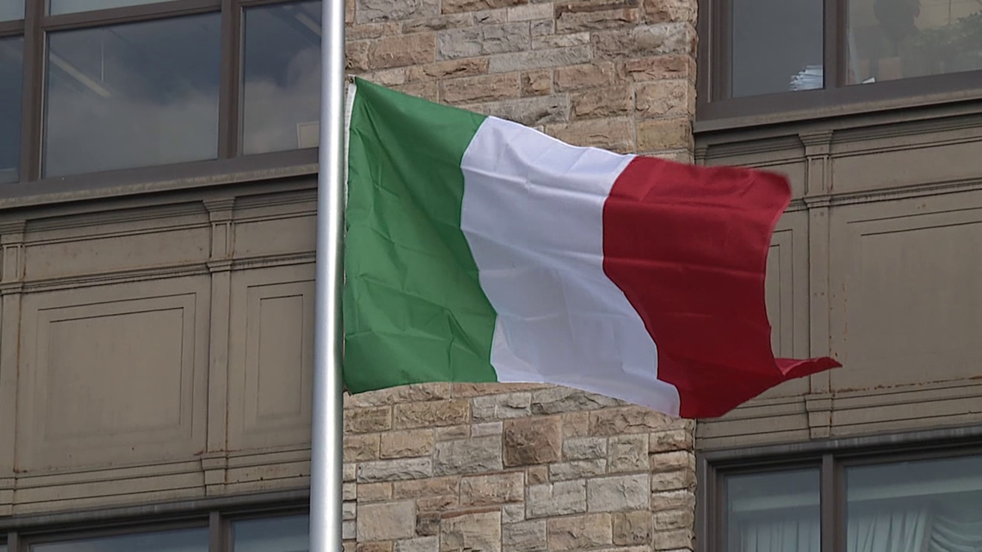 The Italian flag was raised in Courthouse Square Monday afternoon ahead of the Labor Day weekend festival.