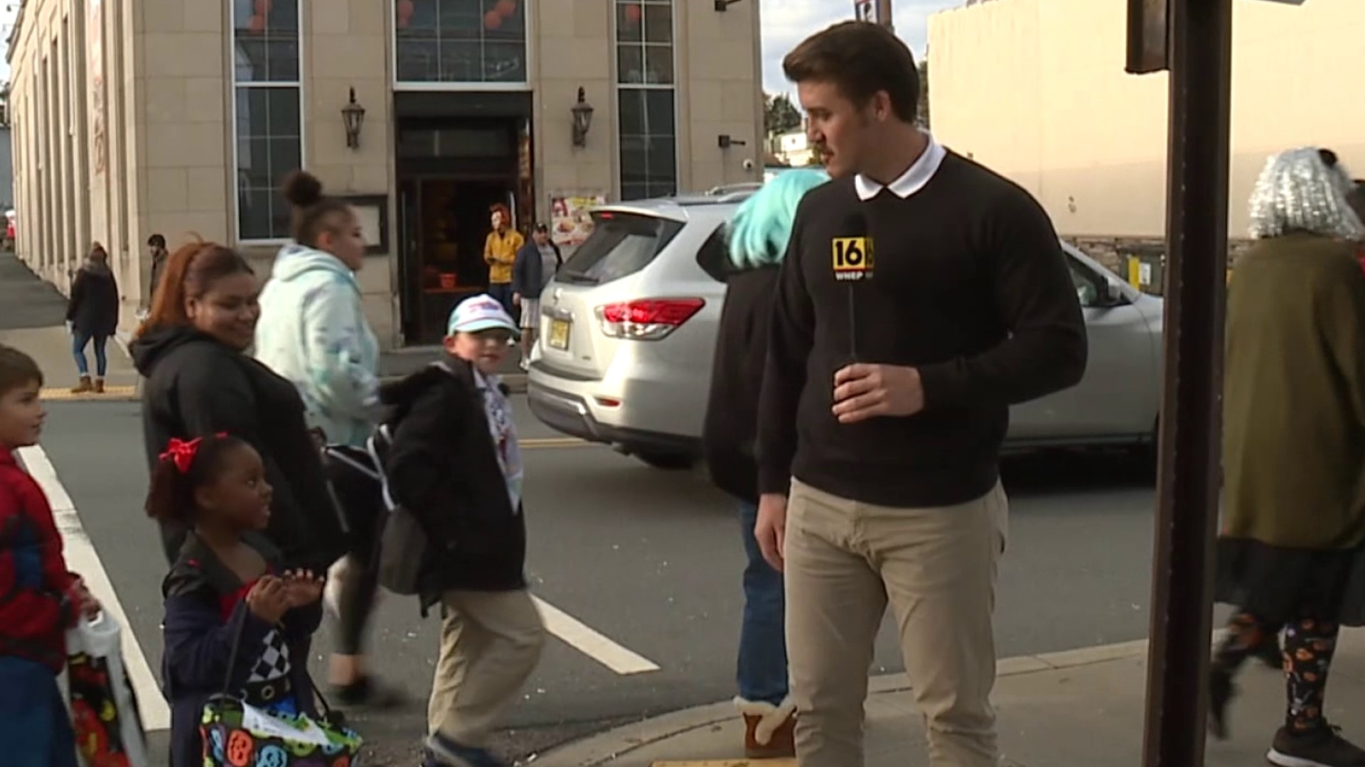 Jack Culkin gets a treat from a sweet kid in Scranton