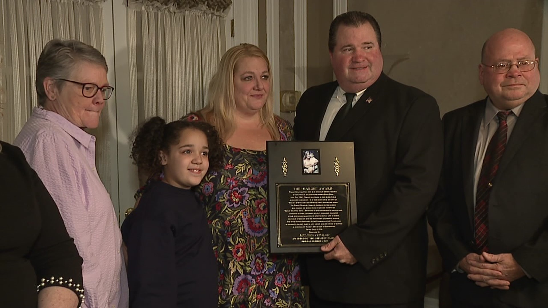 Melissa Conrad received the Margie Memorial Award in memory of Margie Holodnak Davis.