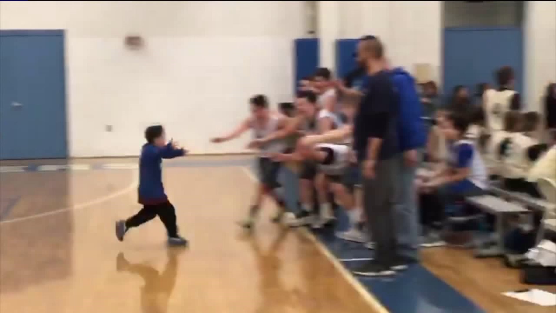 Basketball Team Welcomes Twin Brothers with Down Syndrome