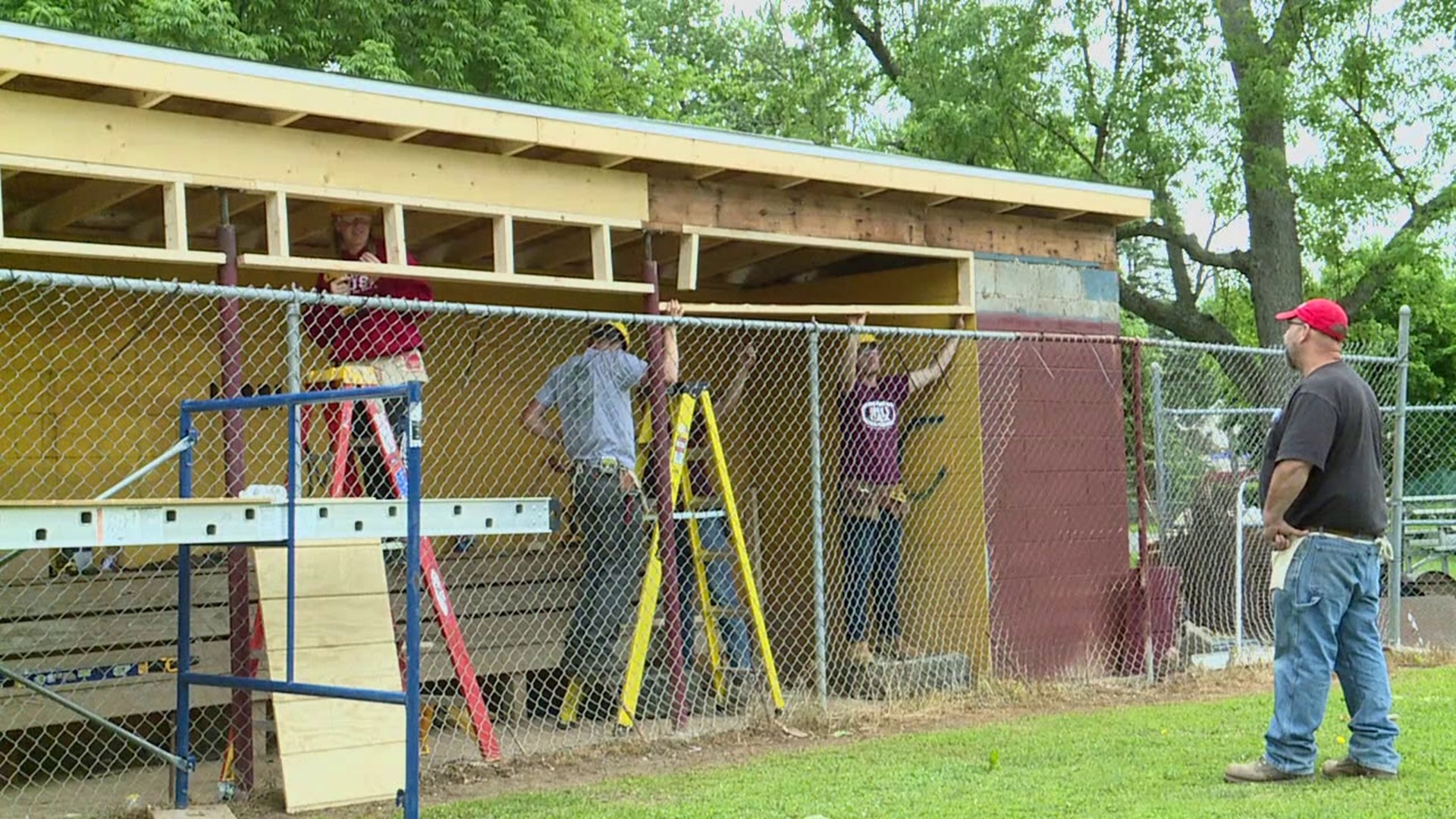 A group of Williamsport Area High School students are making repairs at Brandon Park.
