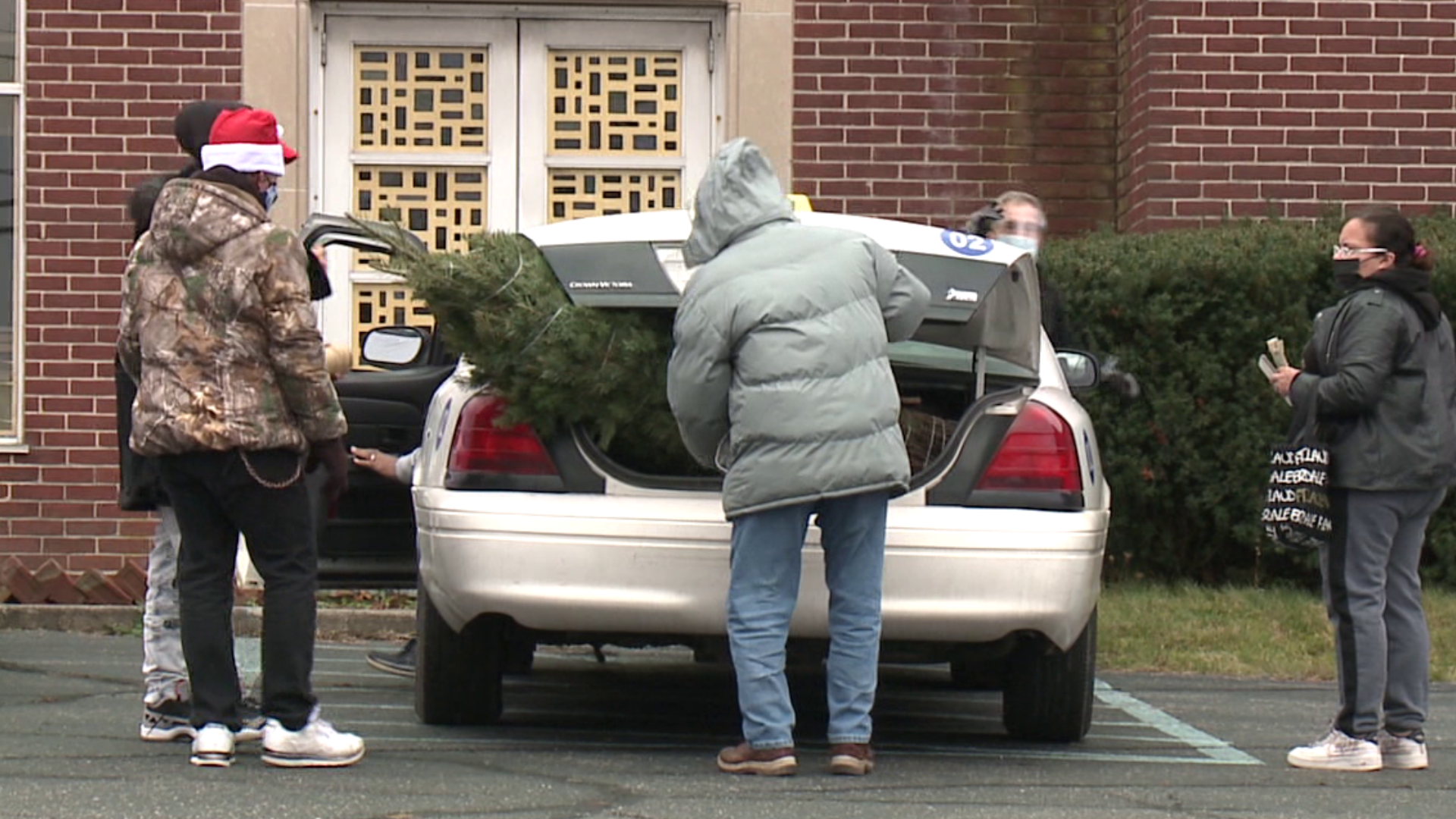 Friends Can Make It Happen gave away 30 Christmas trees Saturday in Luzerne County.