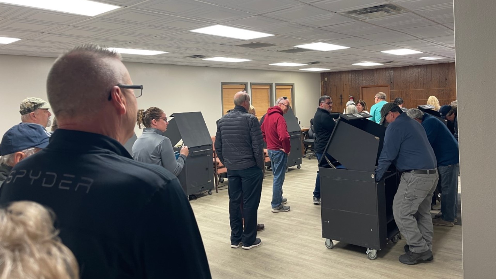 Voters at some precincts indicate that voting machines are running out of paper, and election officials scrambled to address the situation.