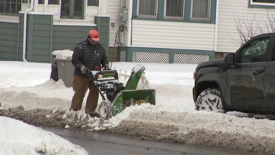 New Milford residents dig out from nearly a foot of snow as kids enjoy snow day