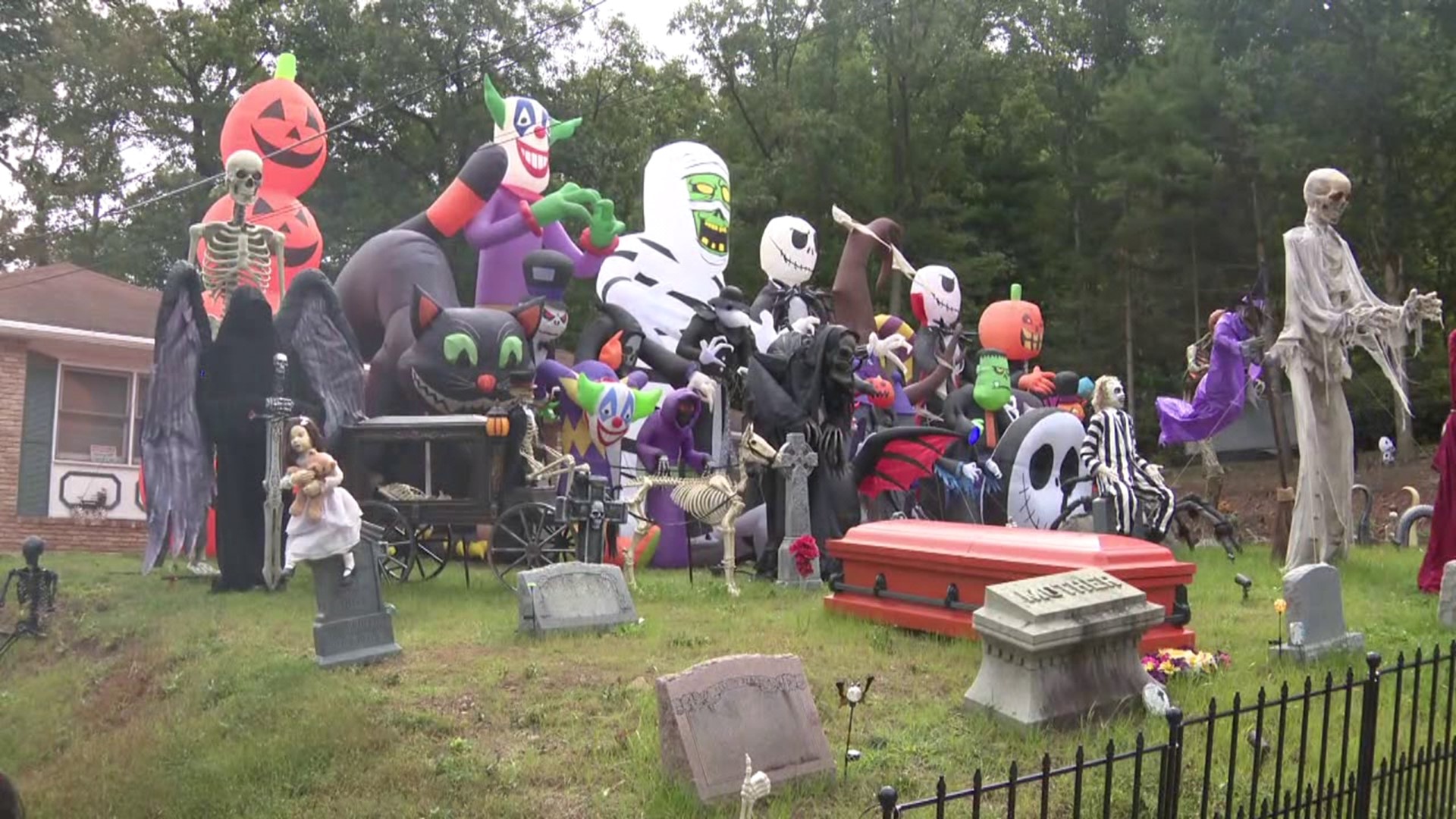 The Halloween display draws so many people that the homeowner is using its popularity to give back. He's collecting school supplies for Panther Valley.
