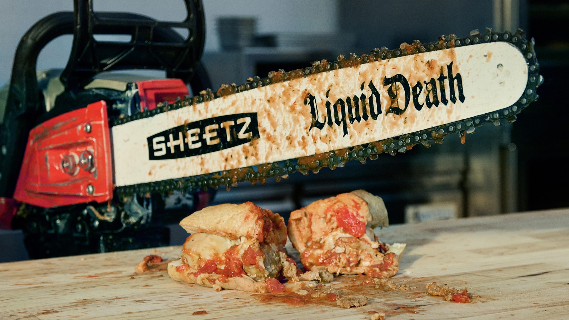 Sheetz and Liquid Death launch a high-octane spectacle that will give customers the option to have their sandwich sliced with a chainsaw.