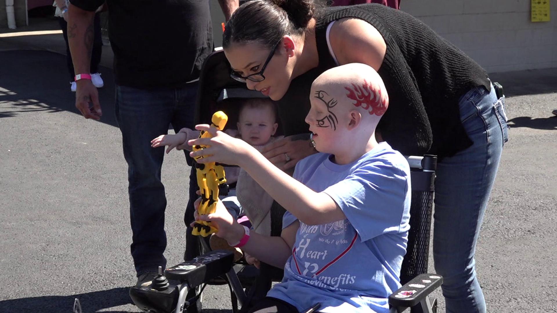 Diagnosed with a rare form of childhood bone cancer, 10-year-old Kevin Green and his father, Kevin Green Jr., have the support of the community.
