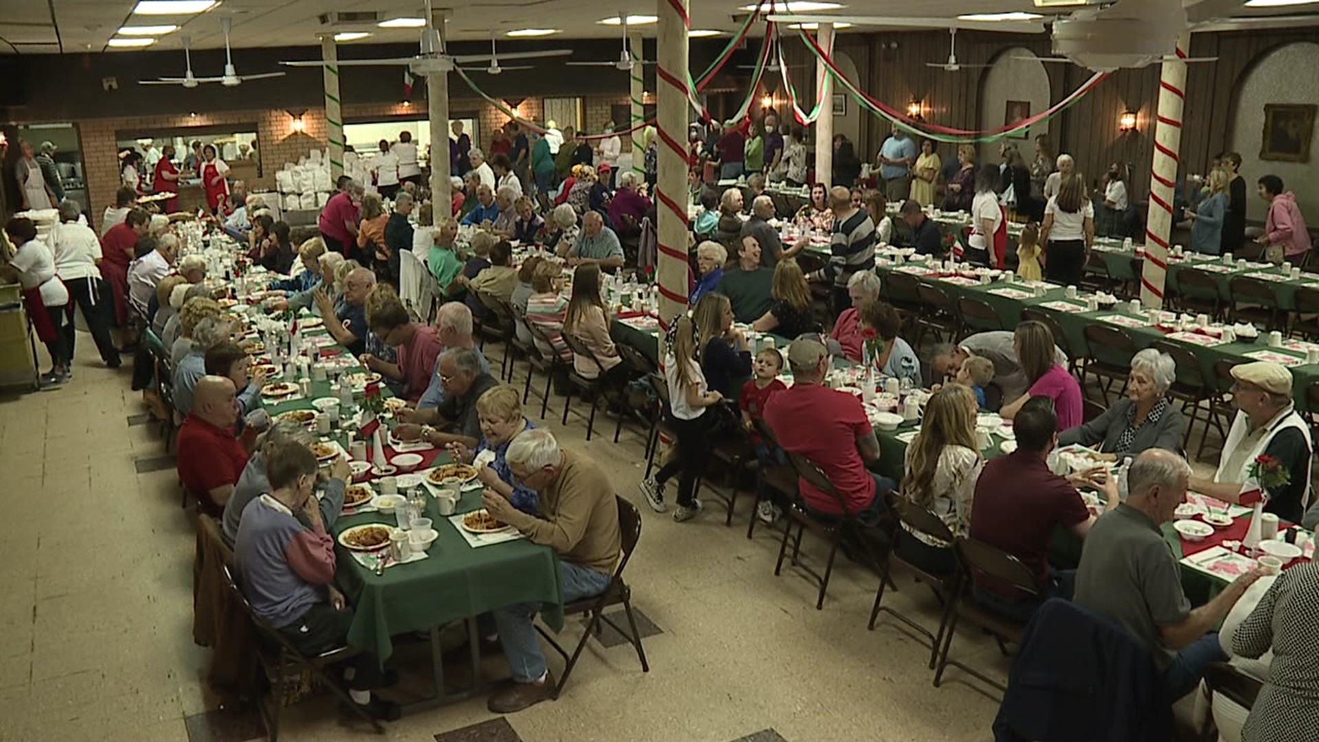 Volunteers at Our Lady of Mount Carmel Church dish up a beloved spaghetti dinner every year.