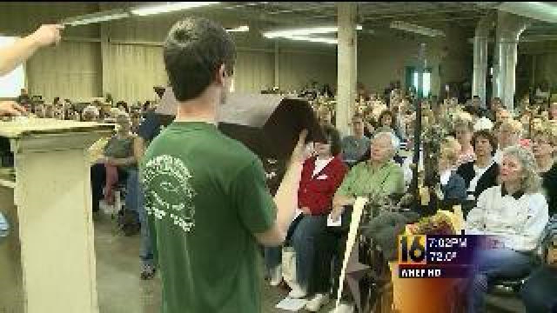 Customers Look for Answers at Auction