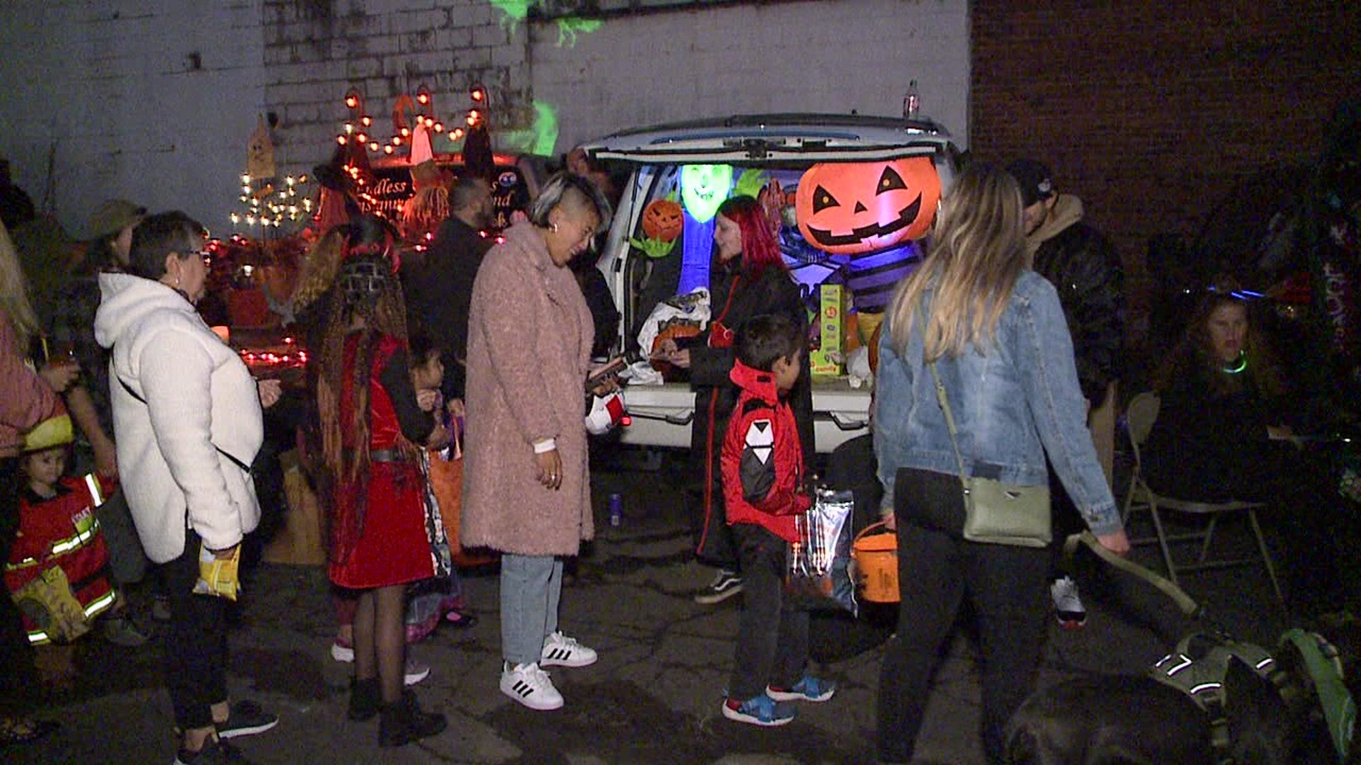 Children filled their Halloween bags with candy in WilkesBarre