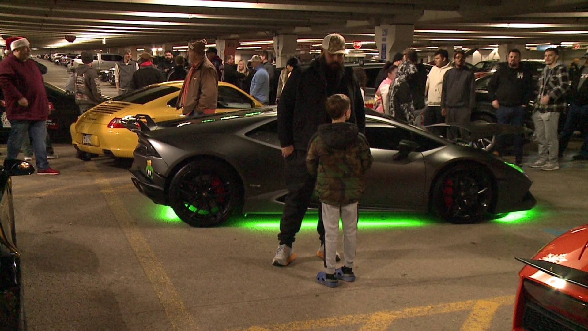 The car show was held at the parking garage at the Marketplace at Steamtown Saturday evening.