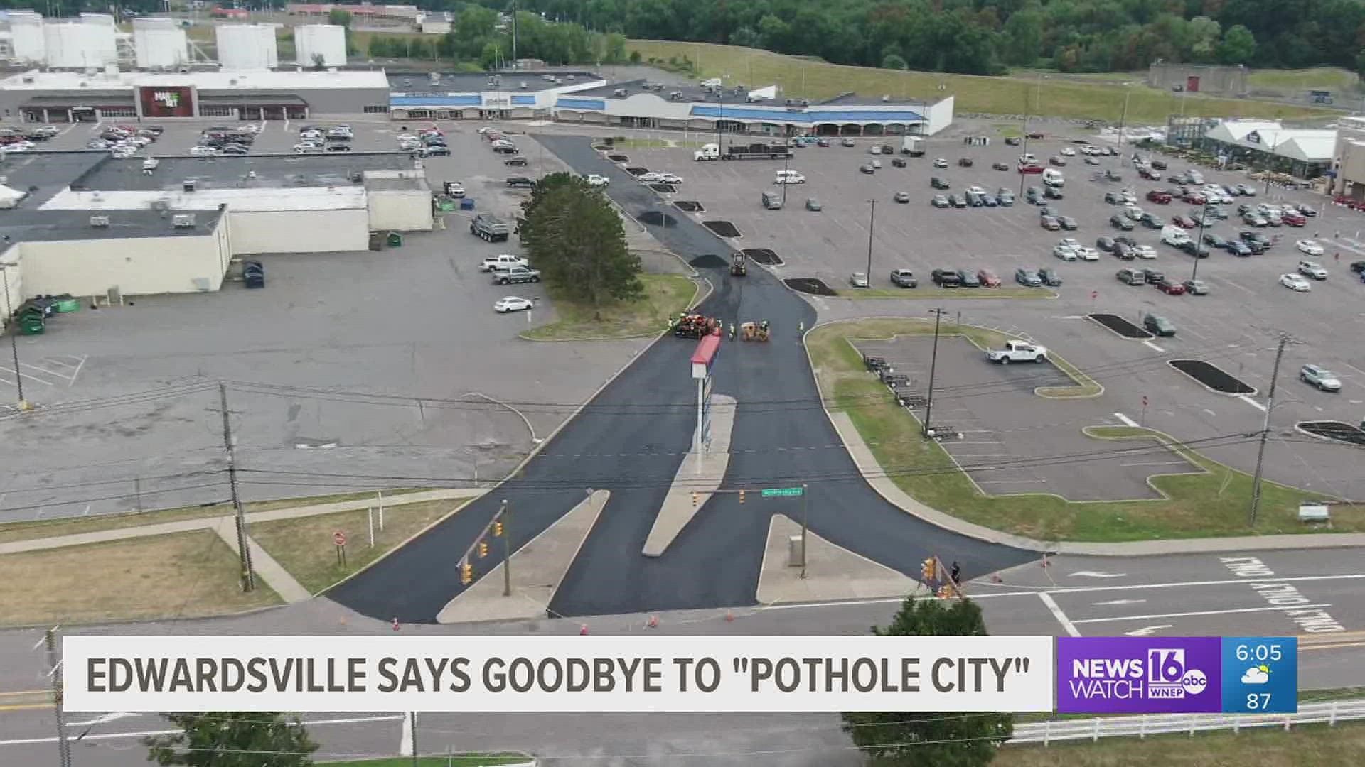 At long last, paving begins at the West Side Mall.