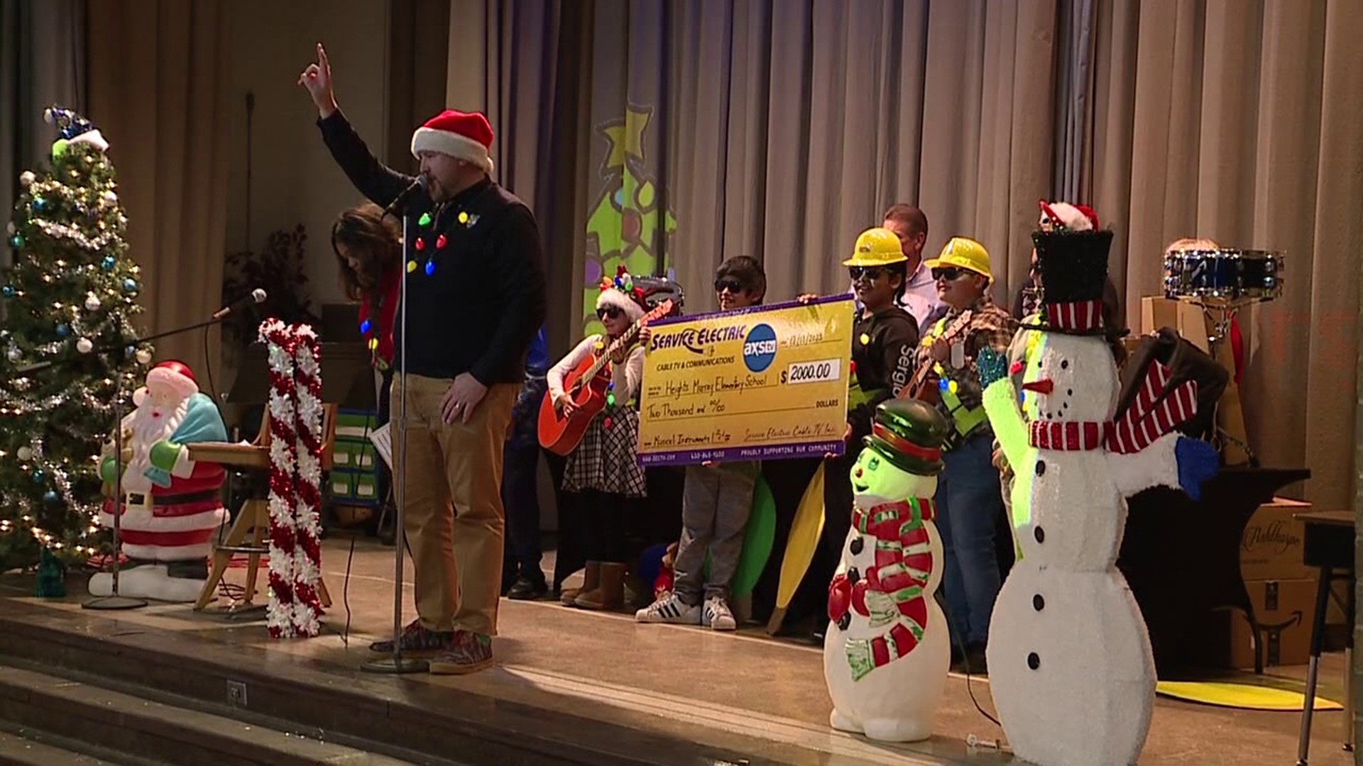 The students at Heights-Murray Elementary School received a donation of $2,000 worth of musical instruments during an assembly to help promote musical education