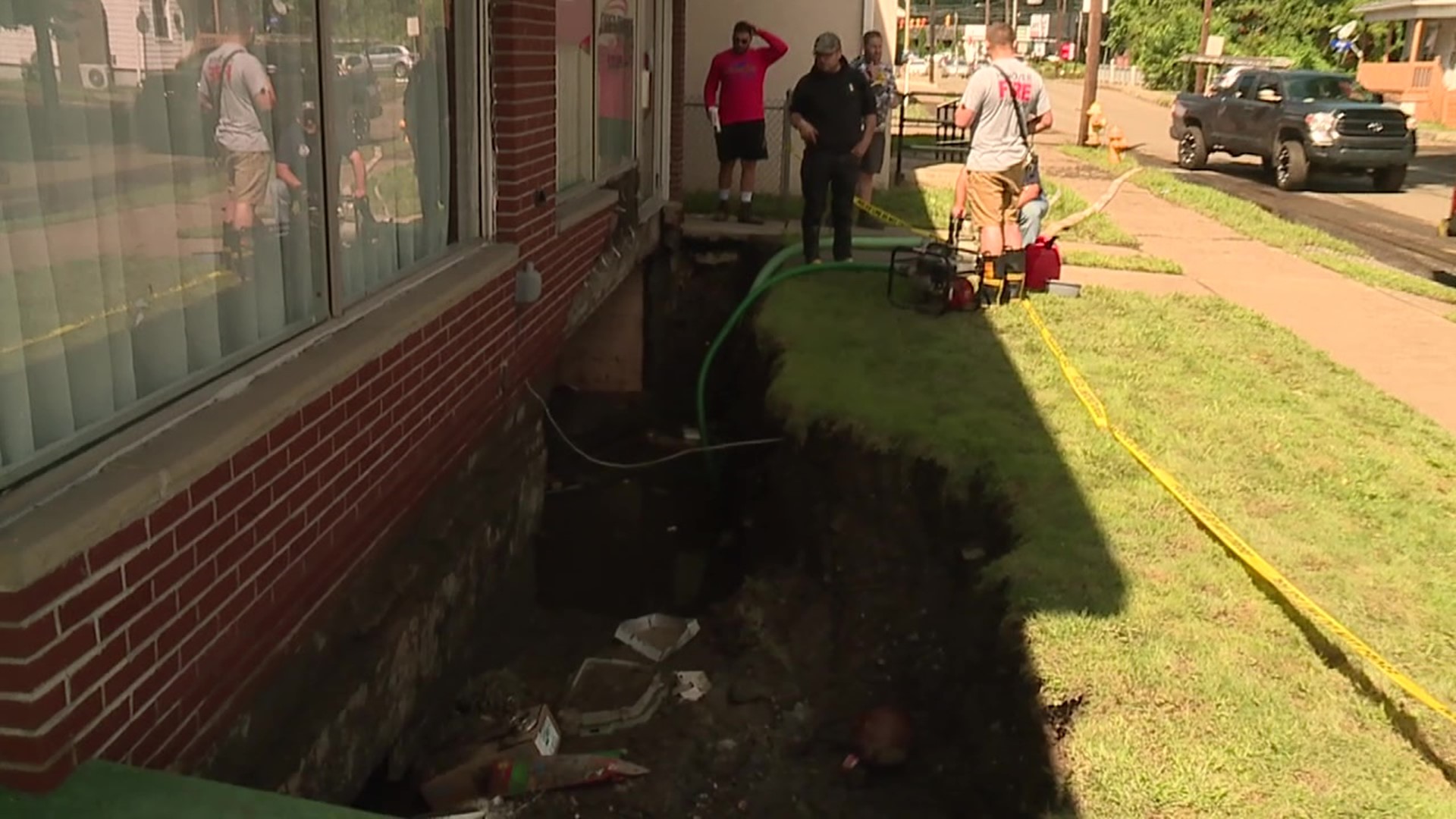 Water from Solomon Creek flooded the home after the basement wall washed away during Wednesday night's rain.