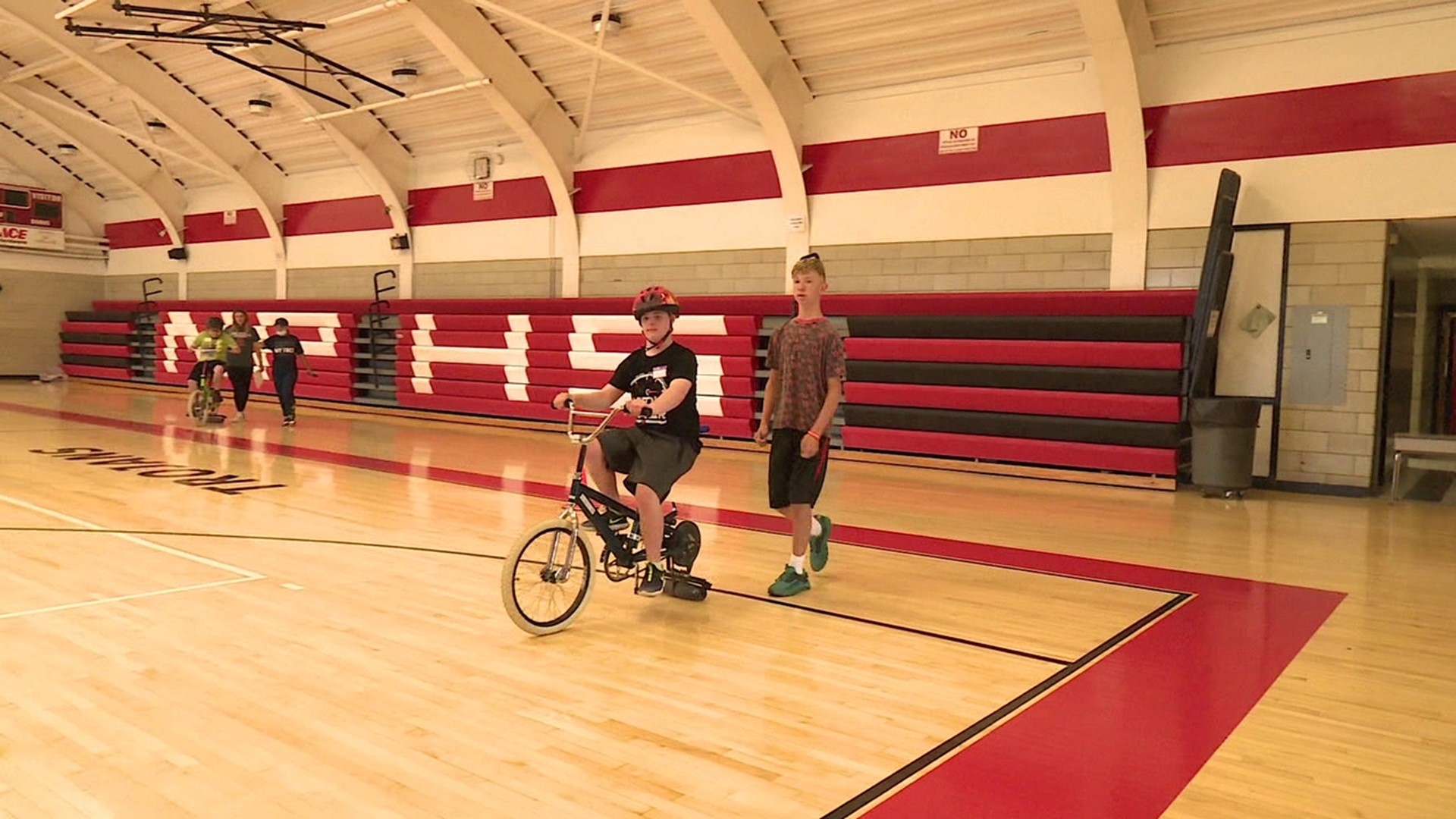 The program helps children with special needs learn how to ride a bicycle.