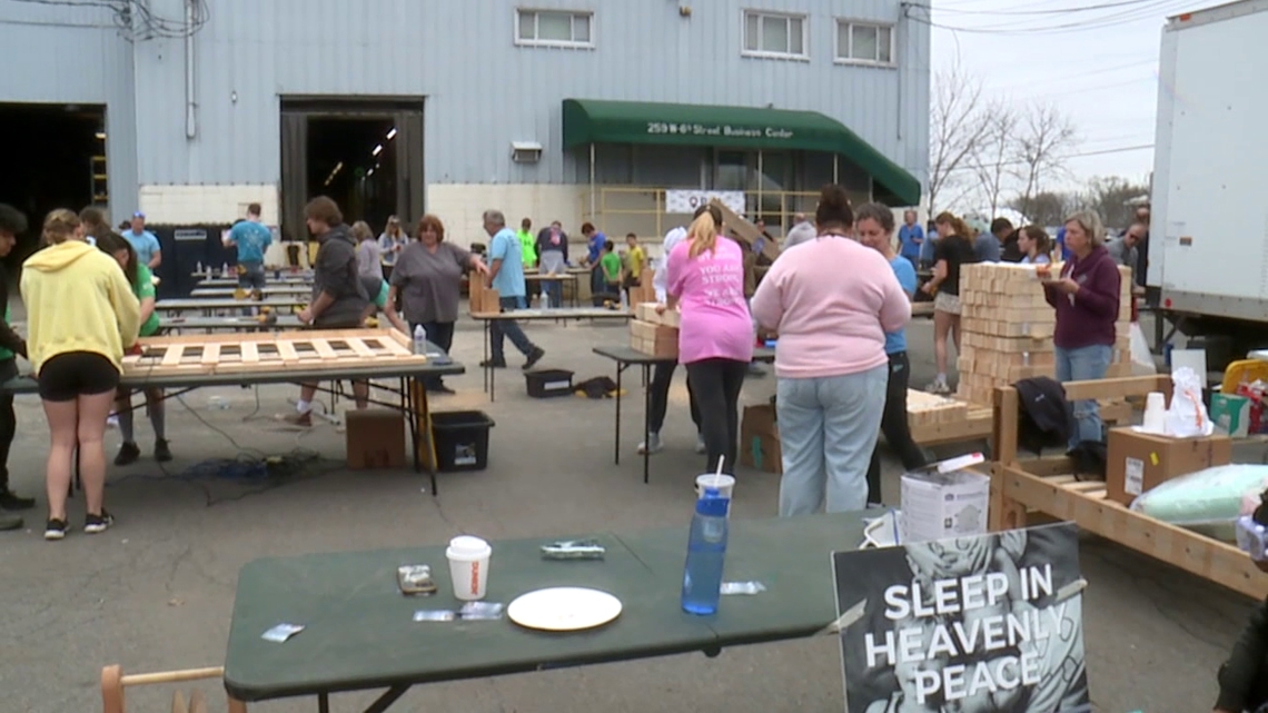 Local volunteers build beds for kids in need