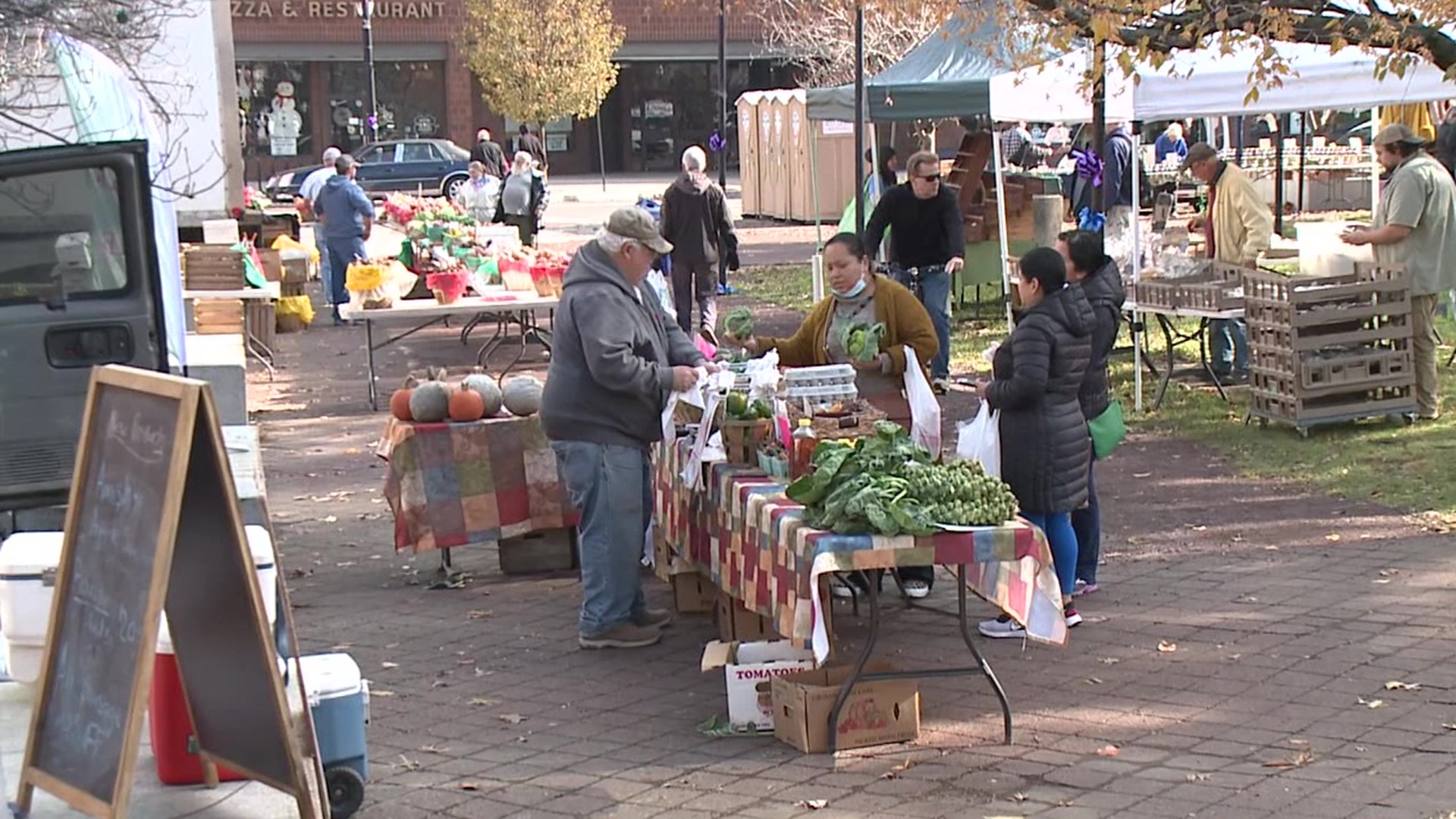 Many came out to purchase Thanksgiving Day needs from local farmers.