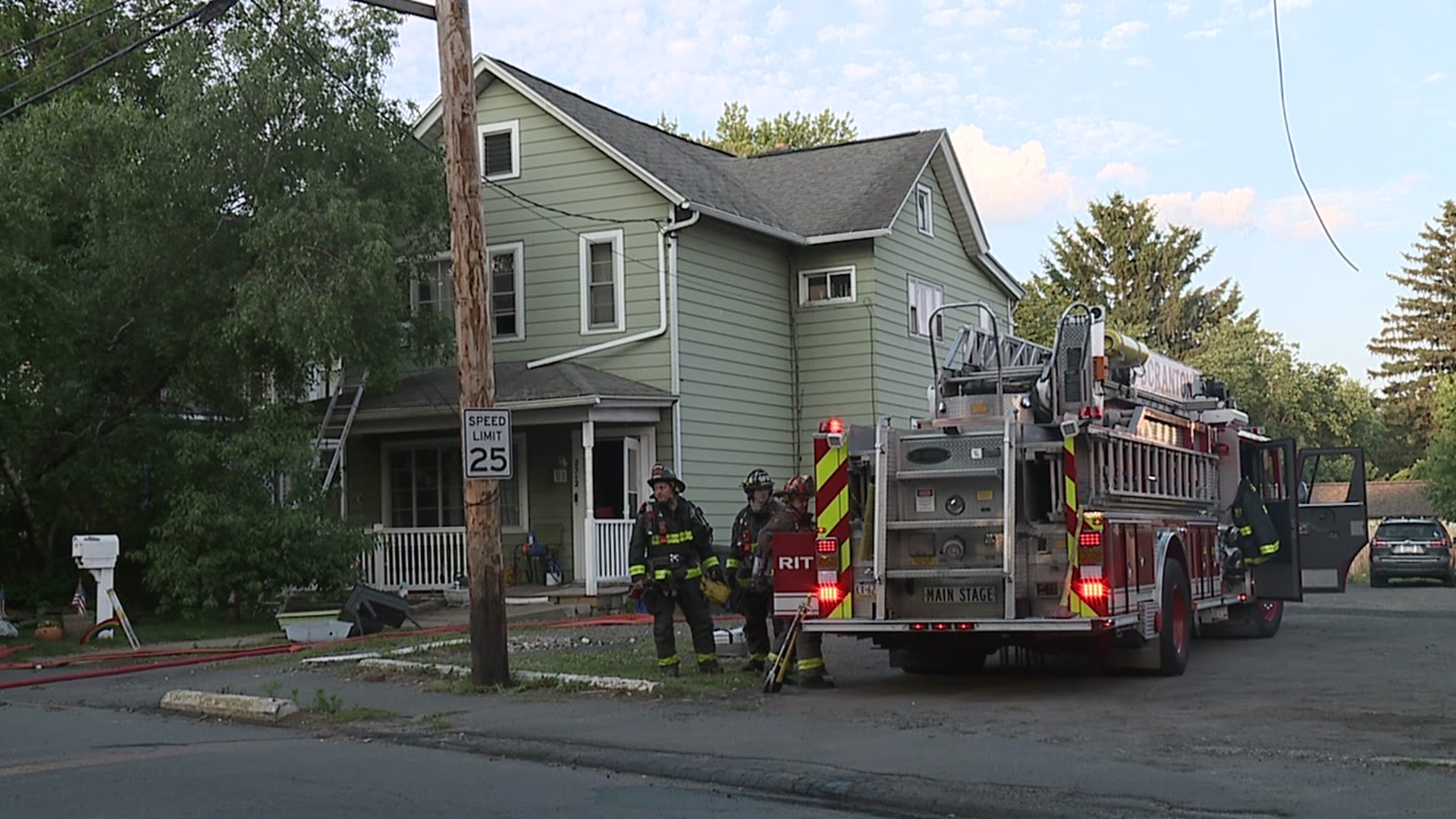 Fire department officials say the fire started in the basement, and four people, two dogs, and two cats made it out safely.