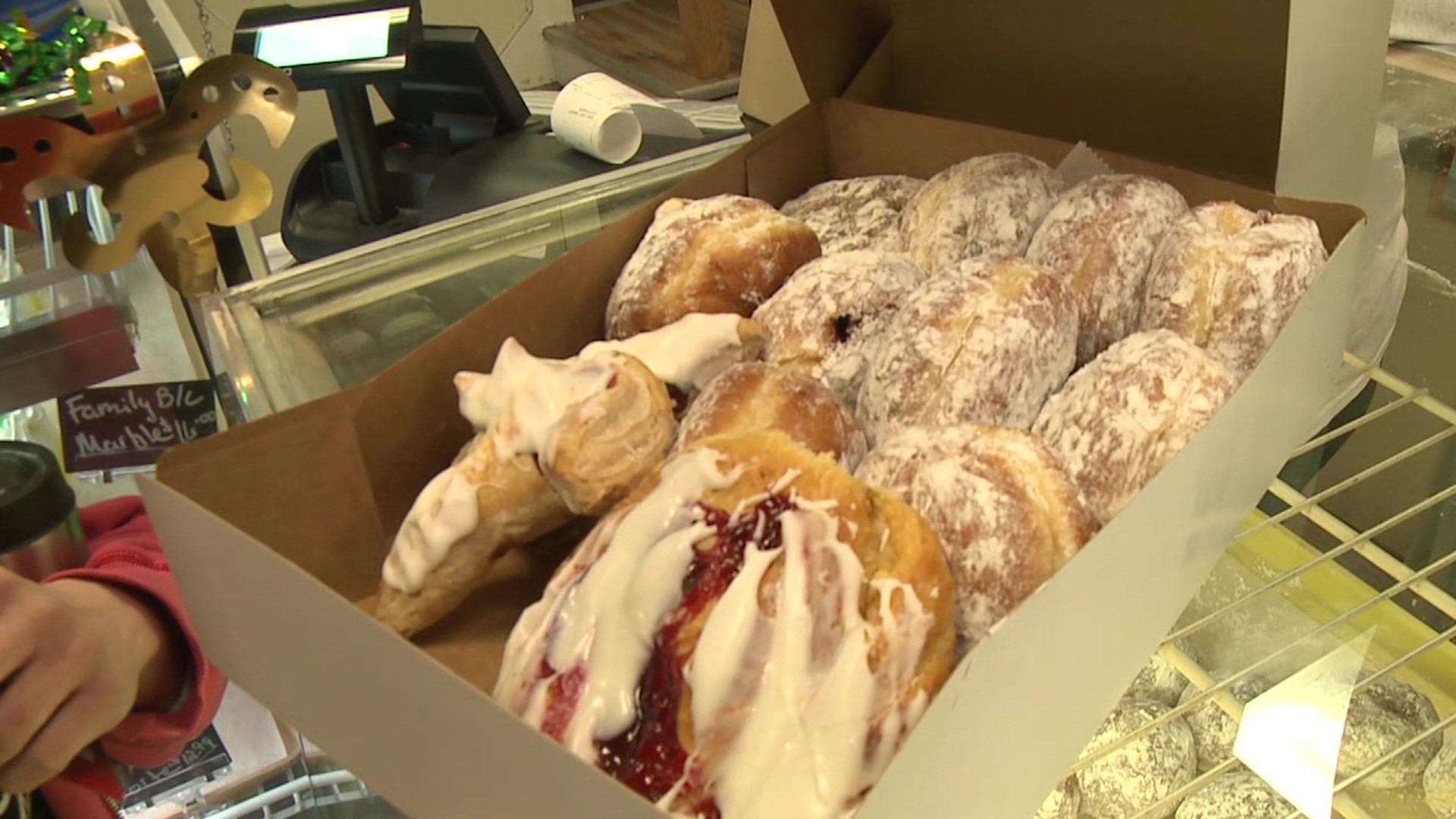 Customers at Sanitary Bakery in Nanticoke enjoyed the Mardi Gras treats on Tuesday.