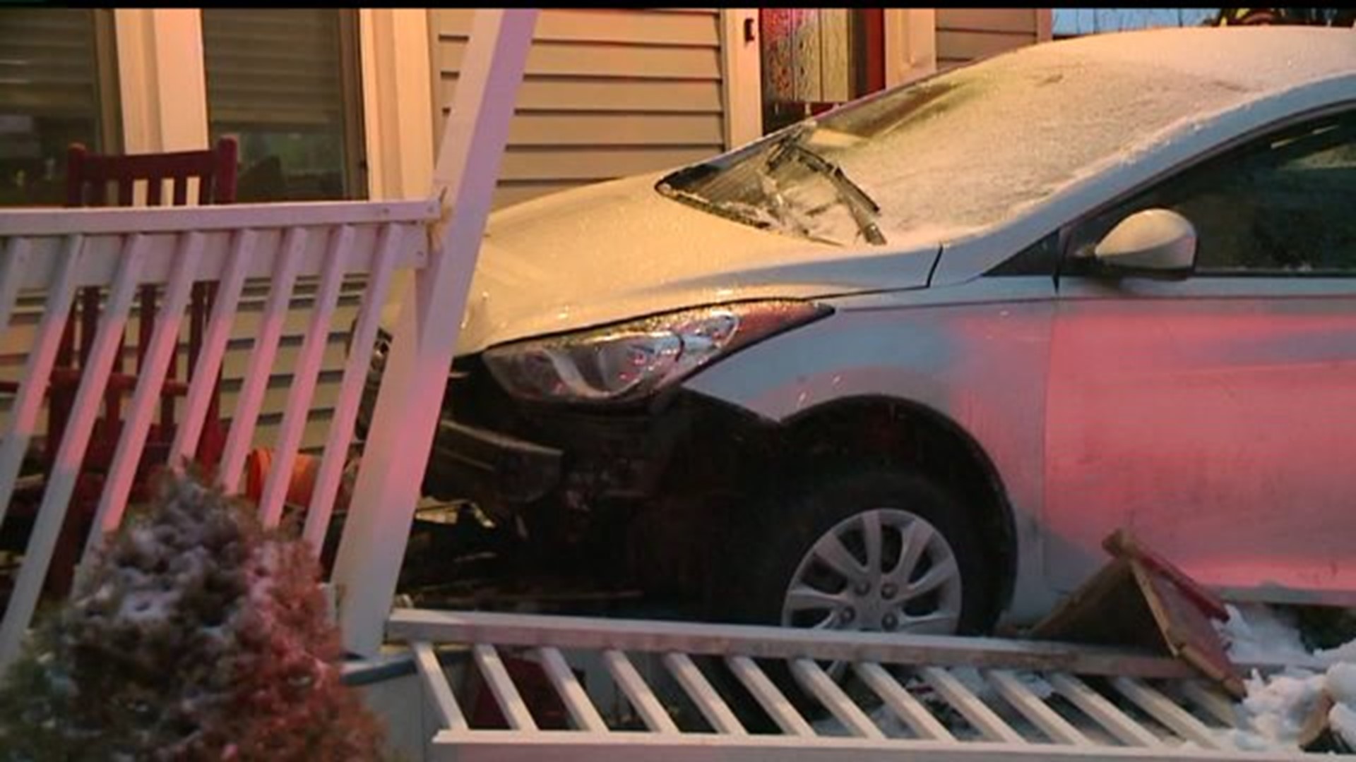 Car Slams into Porch