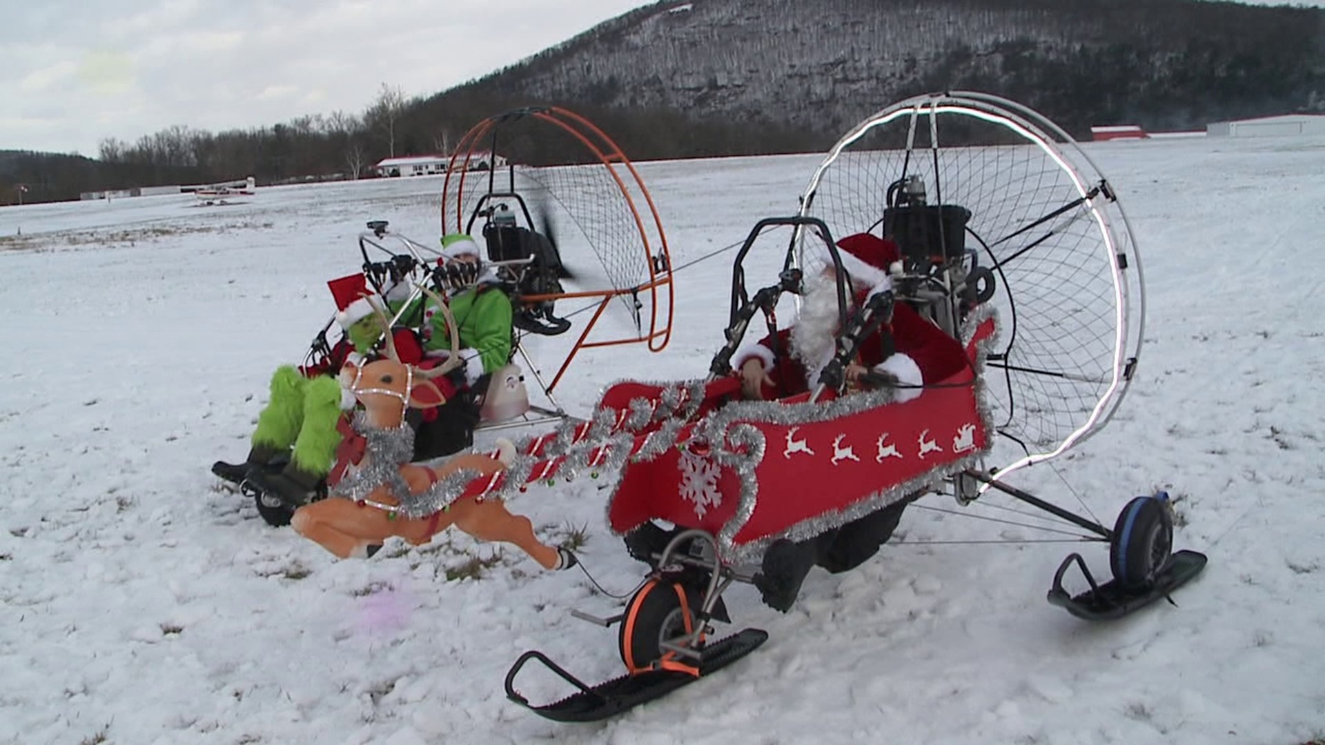 Santa and some helpers glided through the snow at Skyhaven Airport near Tunkhannock Sunday afternoon.