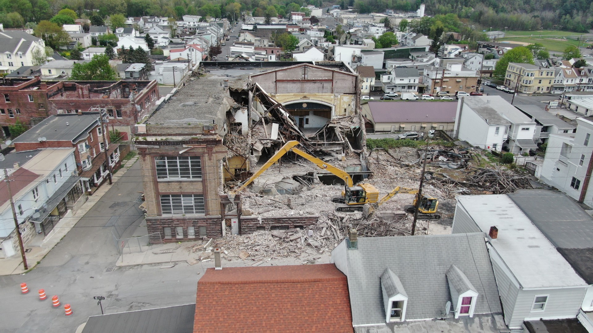 Crews have begun tearing down the J.W. Cooper building along North White Street in Shenandoah.