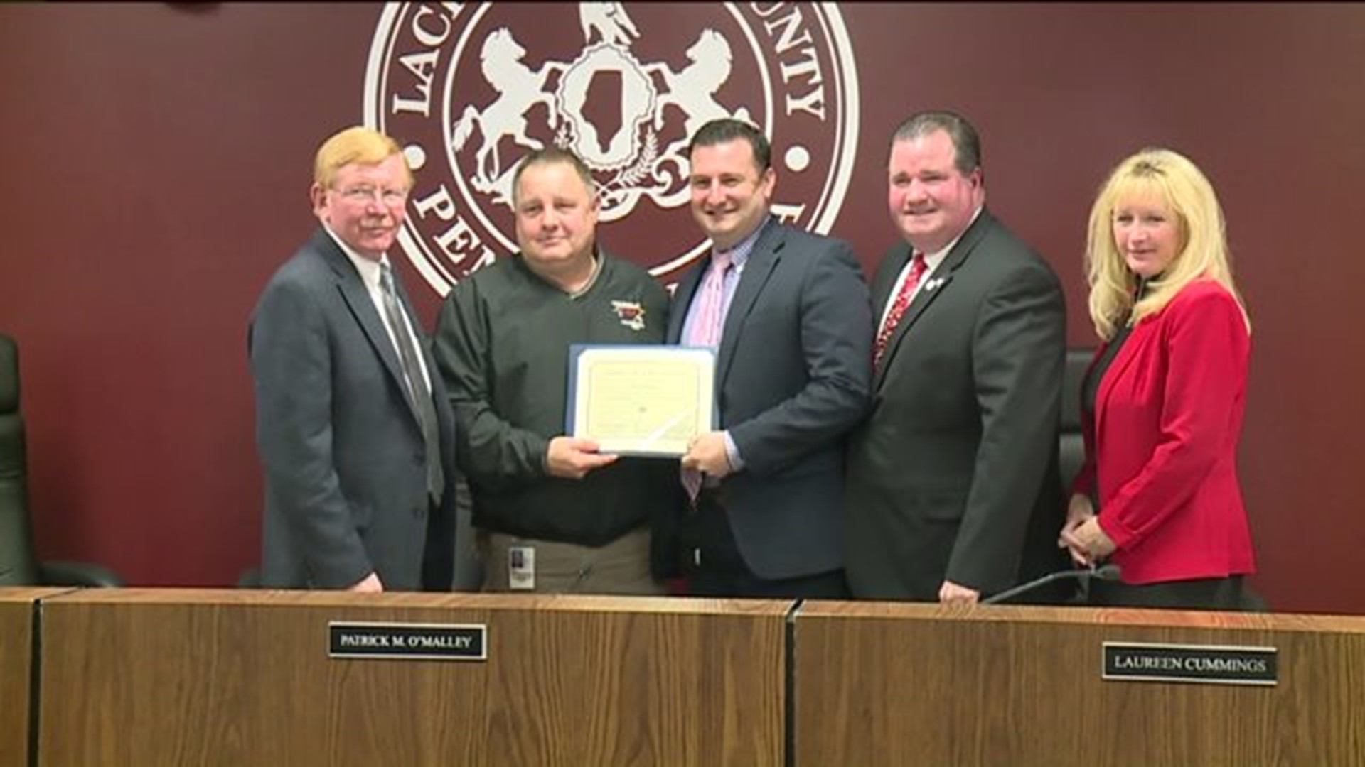 County Worker Honored for Saving Co-worker