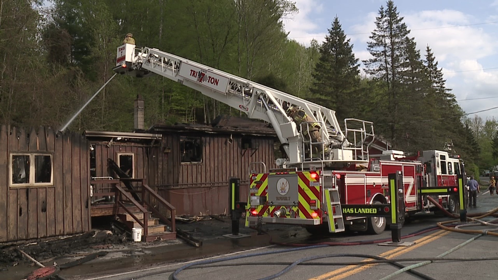 Staff inside Gin's Tavern went from serving lunch to running for their lives after a fire spread throughout the building.