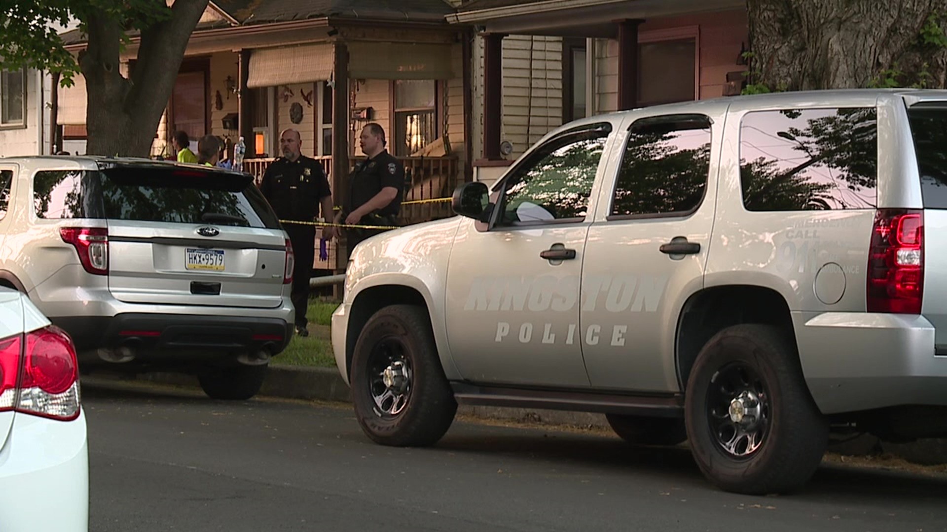 Police were back at the scene of a homicide, this time searching the apartment next door.